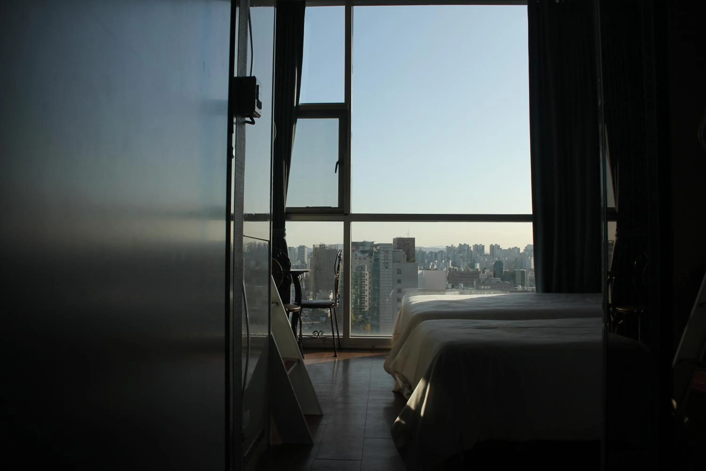 Bed in Myeongdong Merlin Hotel