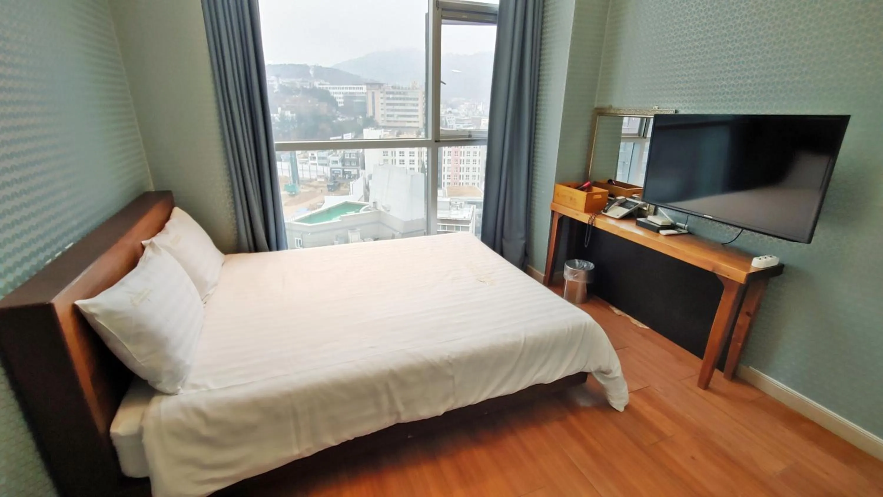 Bed in Myeongdong Merlin Hotel