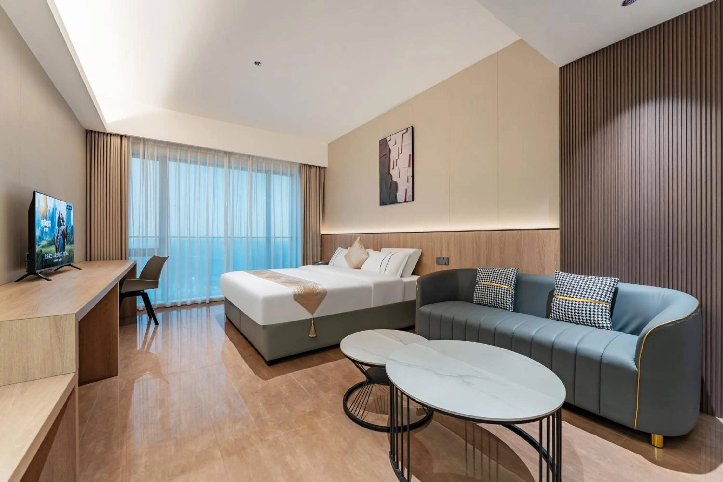 Photo of the whole room, Bed in Yicheng Pazhou Poly World Trade Centre Apartment