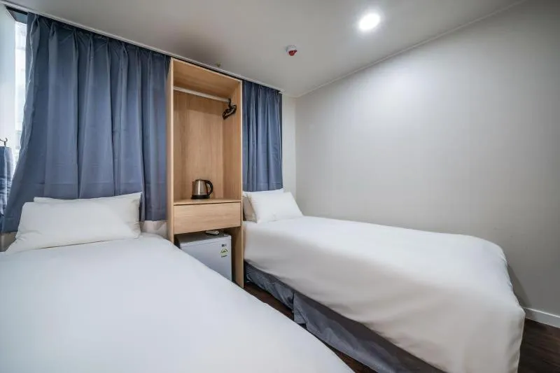 Bed in MAYONE HOTEL Myeongdong