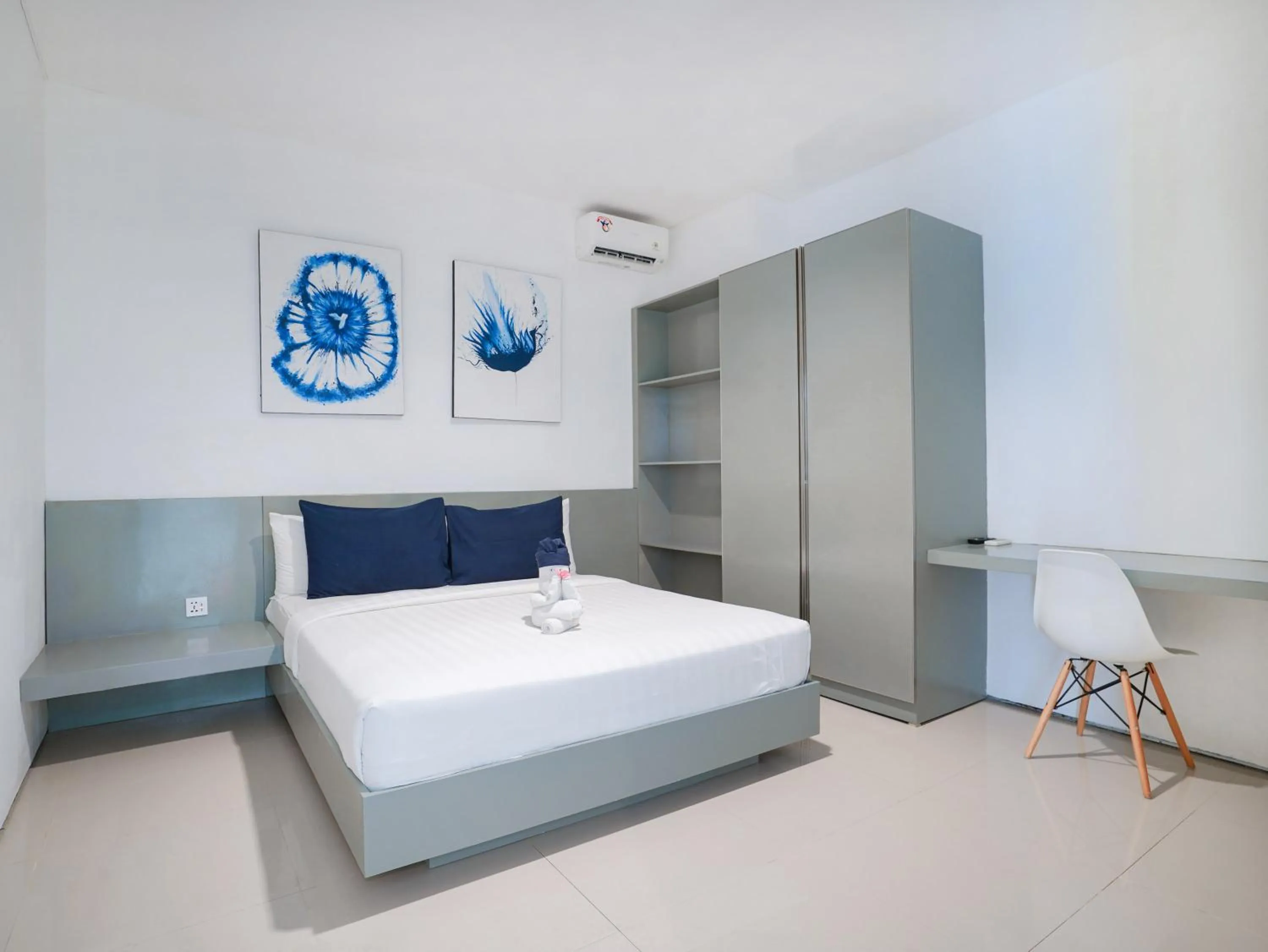 Bed in The Rooms Apartment Bali by ARM Hospitality