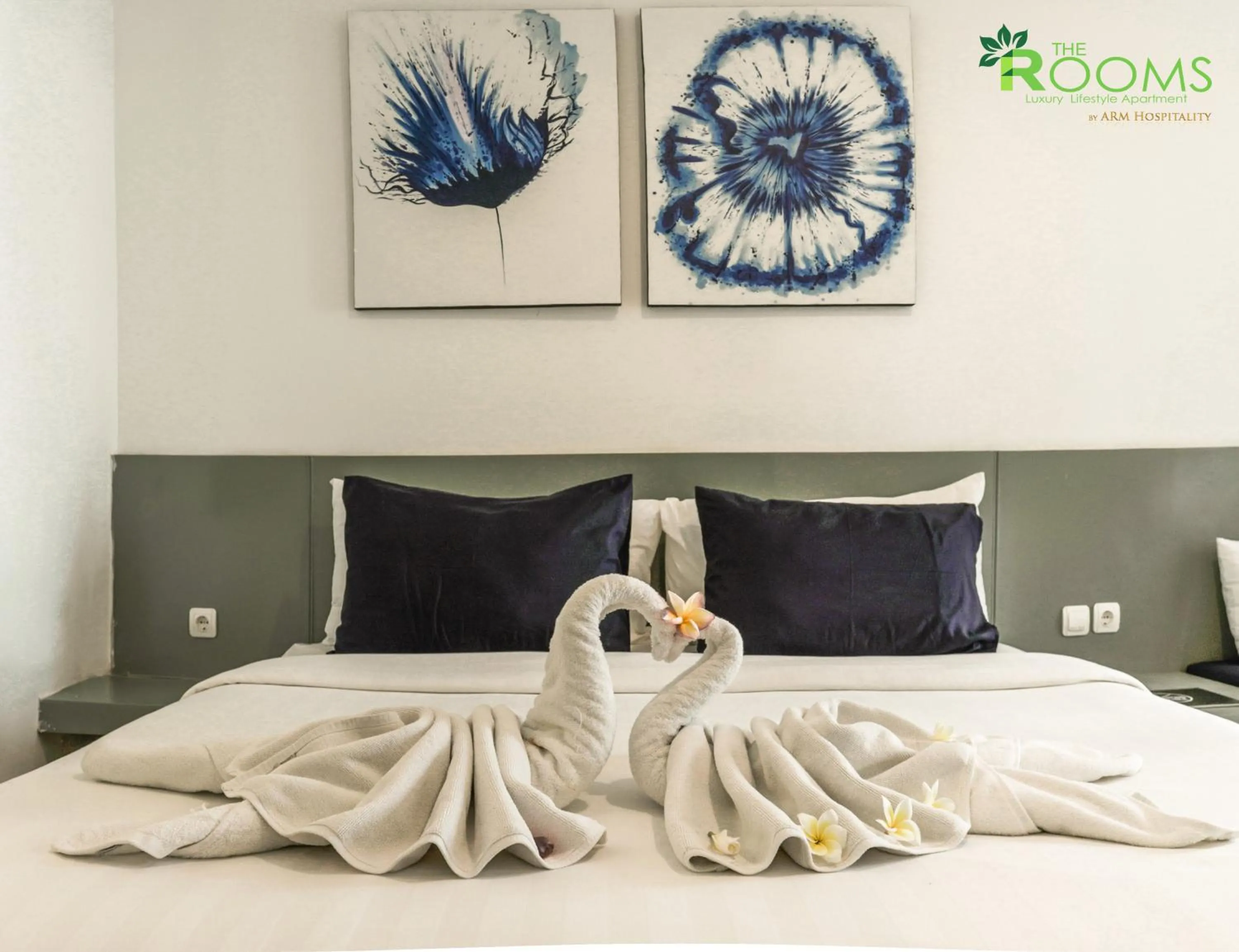 Bed in The Rooms Apartment Bali by ARM Hospitality