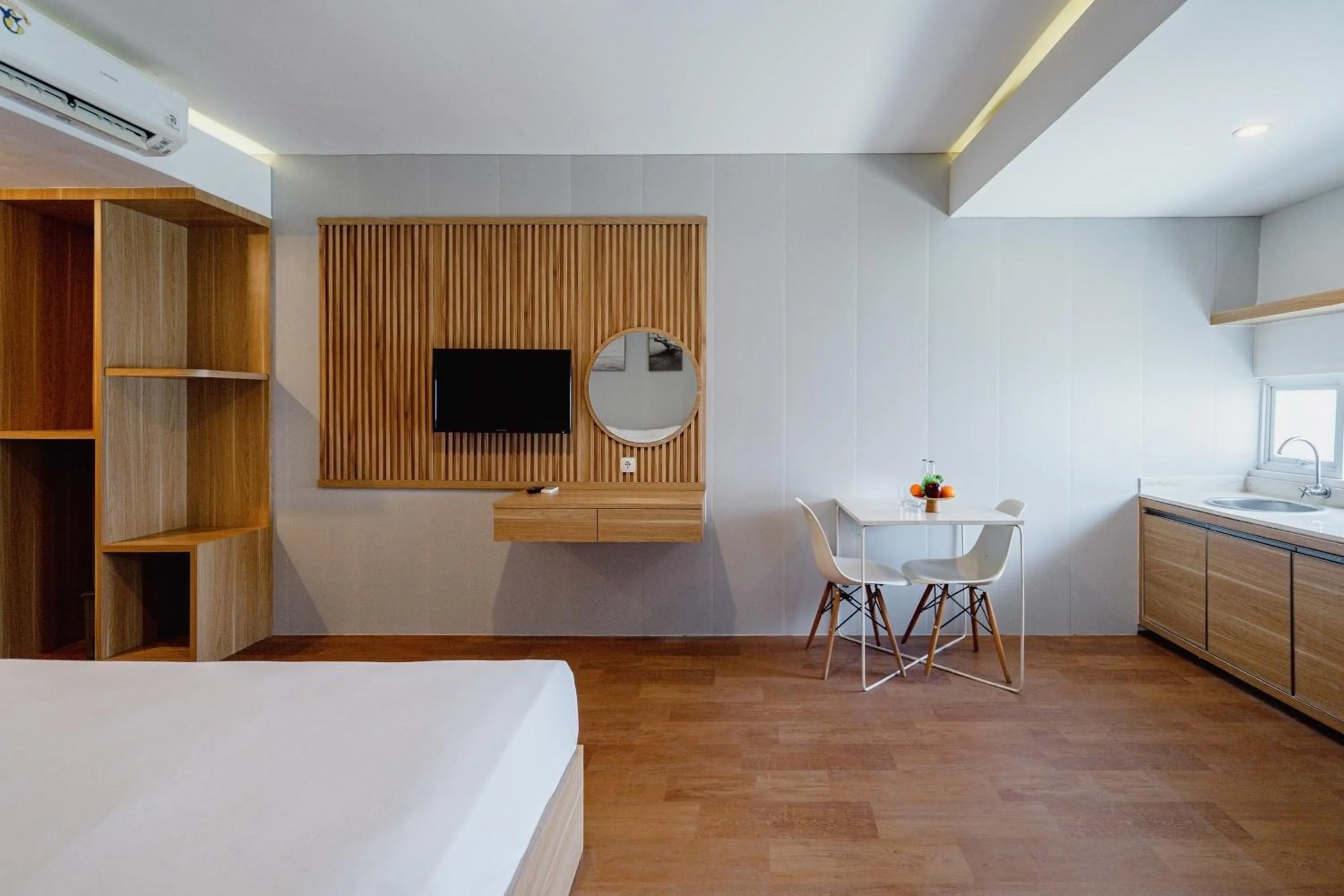 wardrobe, Bed in The Rooms Apartment Bali by ARM Hospitality