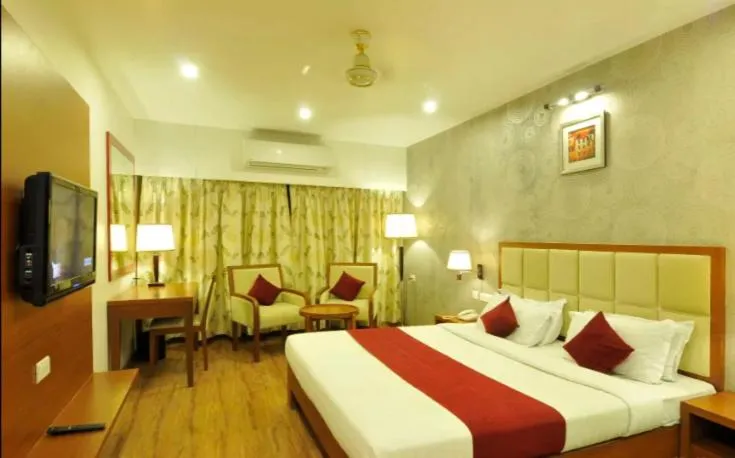 Photo of the whole room, Bed in Hotel Aditya