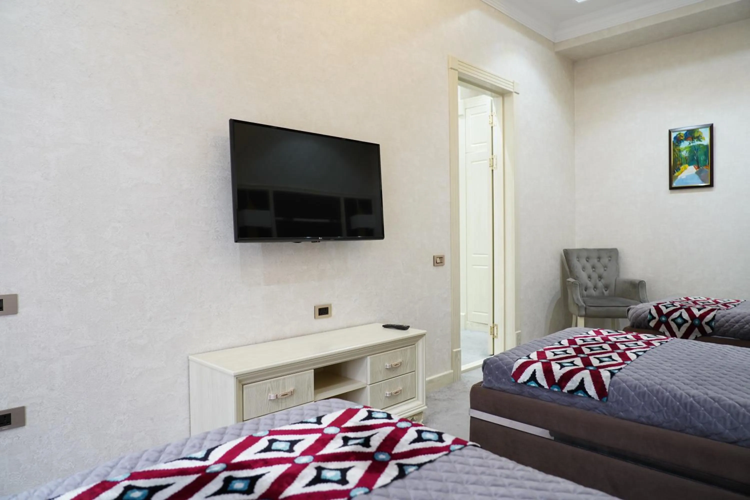 TV and multimedia, Bed in Shaxzoda Elite Hotel