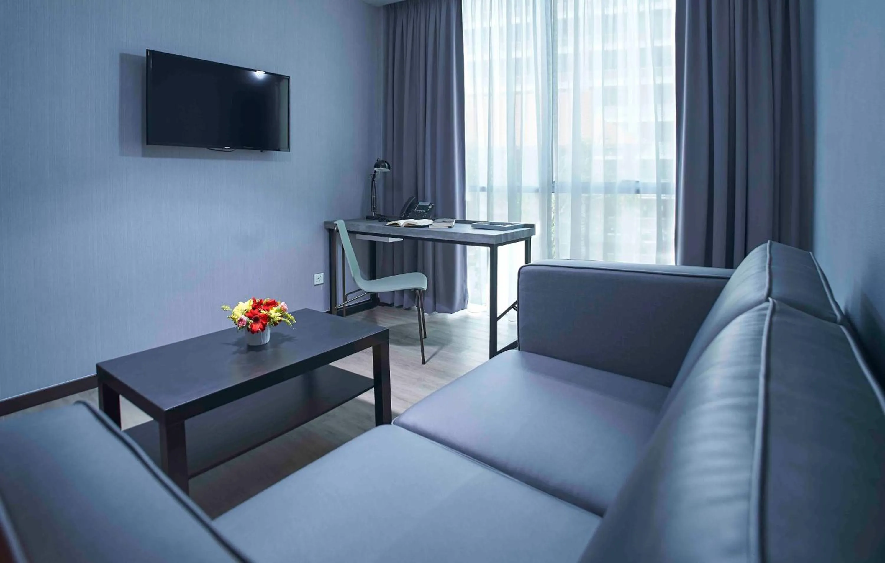 Seating area in Urban H Hotel