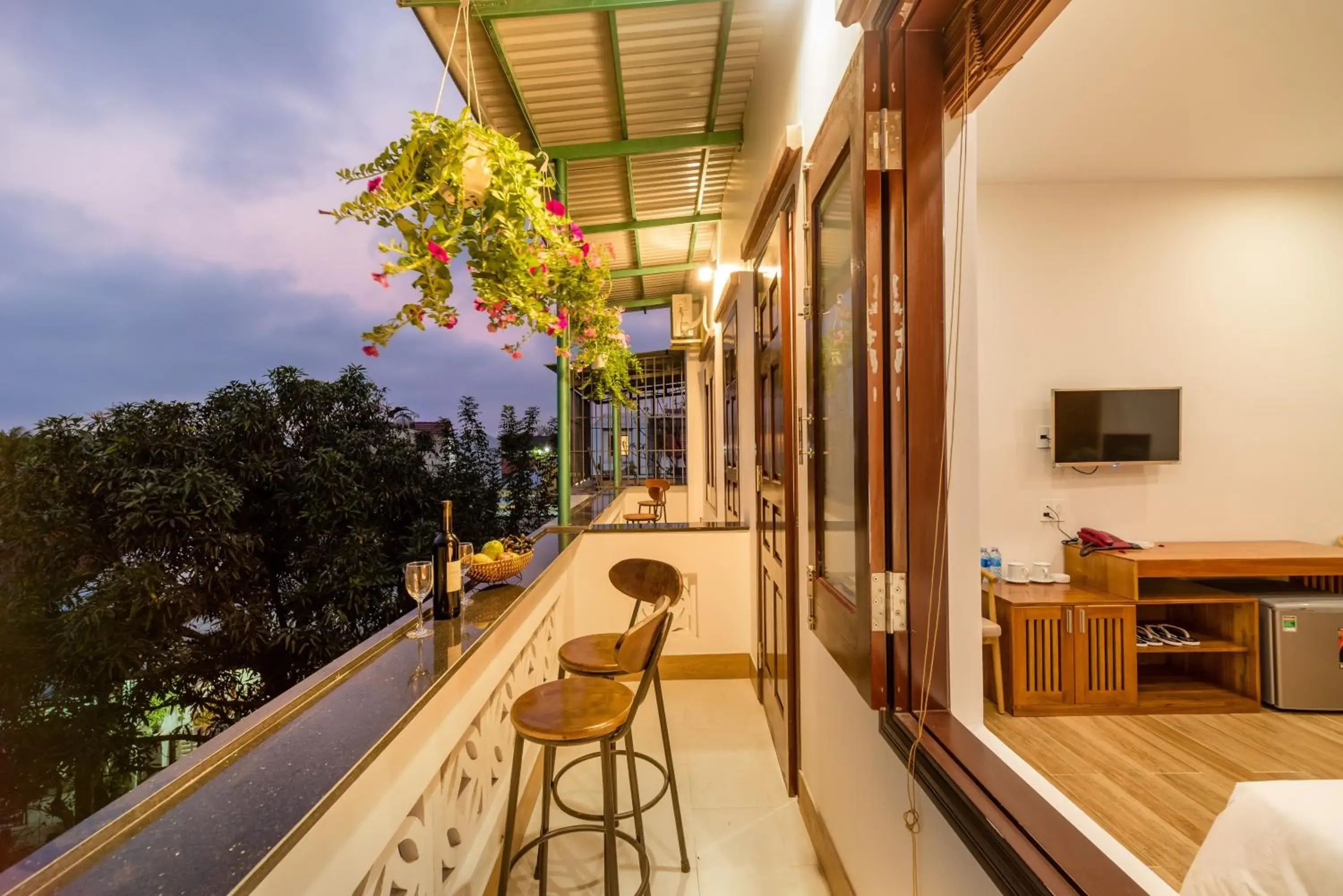 Deluxe Queen Room with Balcony in Phong Phu Villa Hoi An Deluxe Queen Room with Balcony in Phong Phu Villa Hoi An