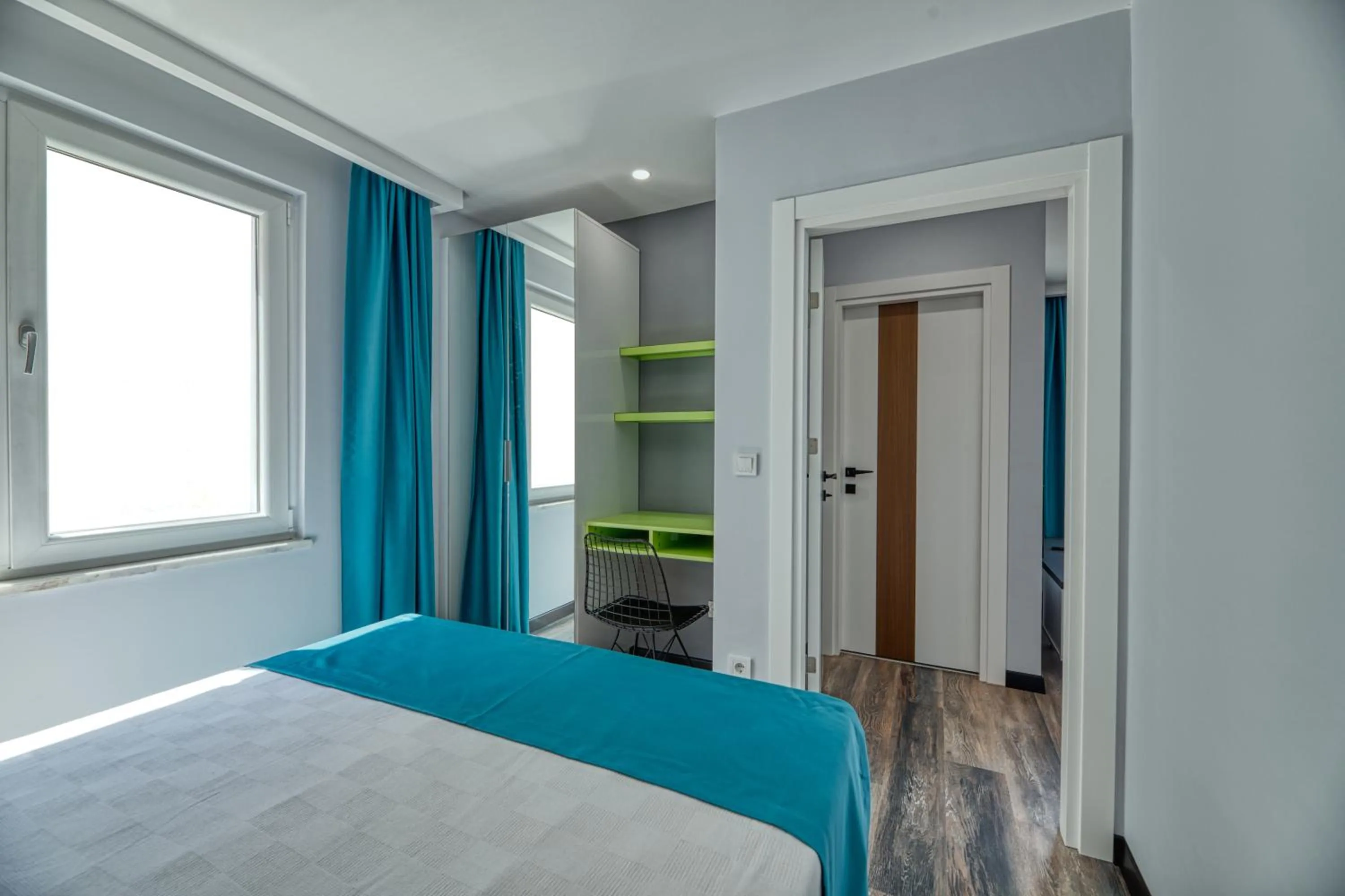 Bed in Grisverde Suites