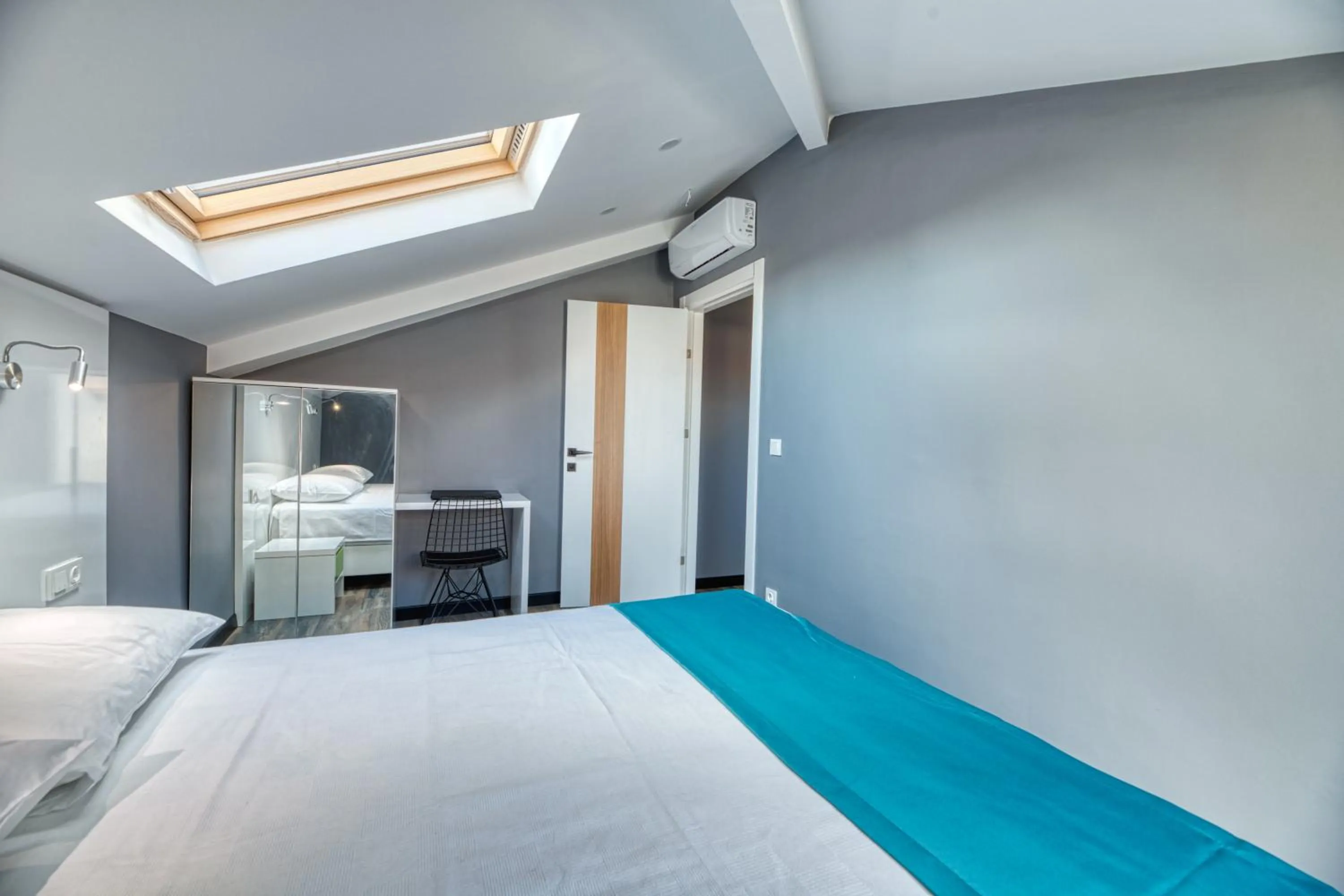 Bed in Grisverde Suites