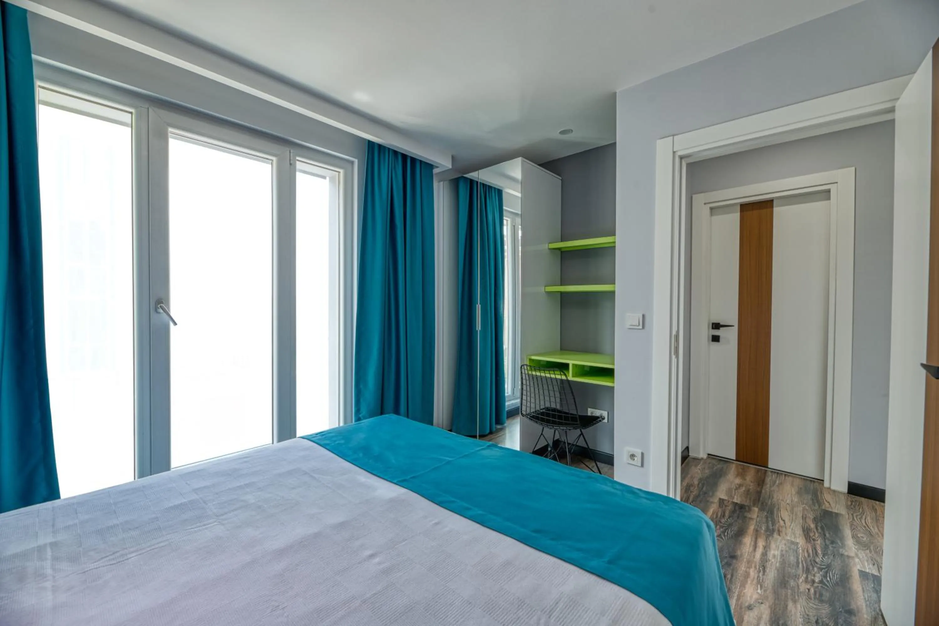 Bed in Grisverde Suites