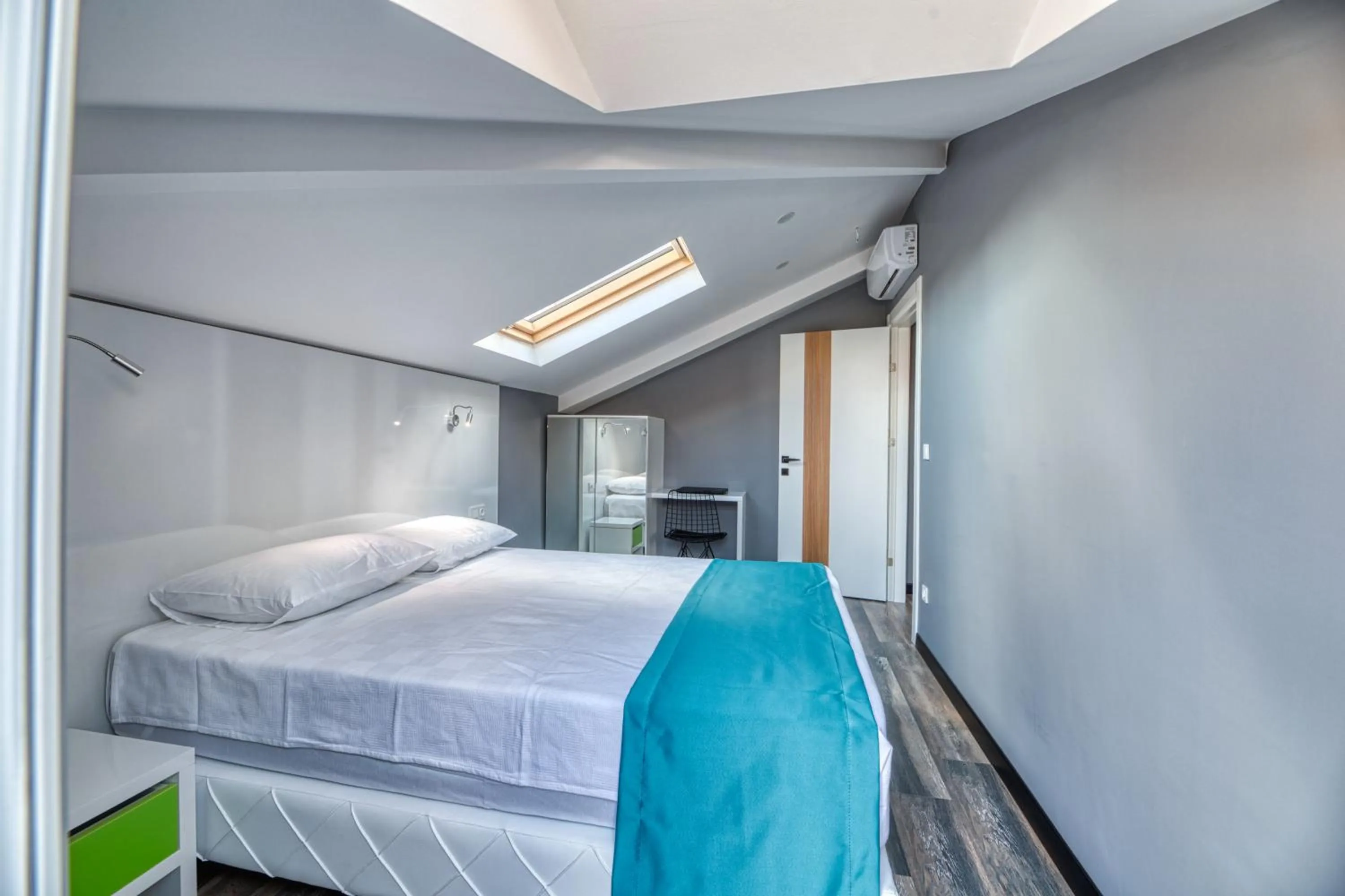 Bed in Grisverde Suites