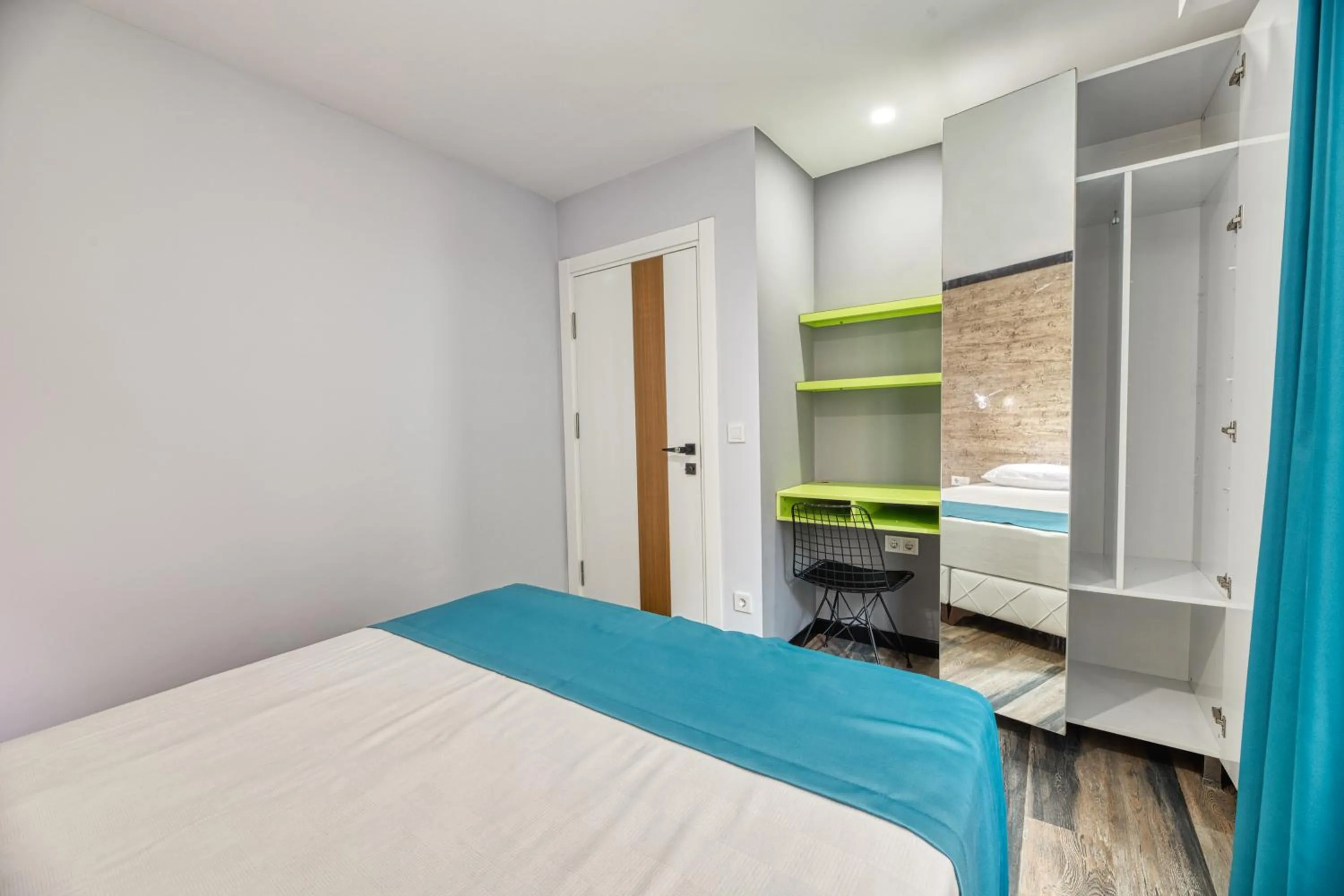 Bed in Grisverde Suites