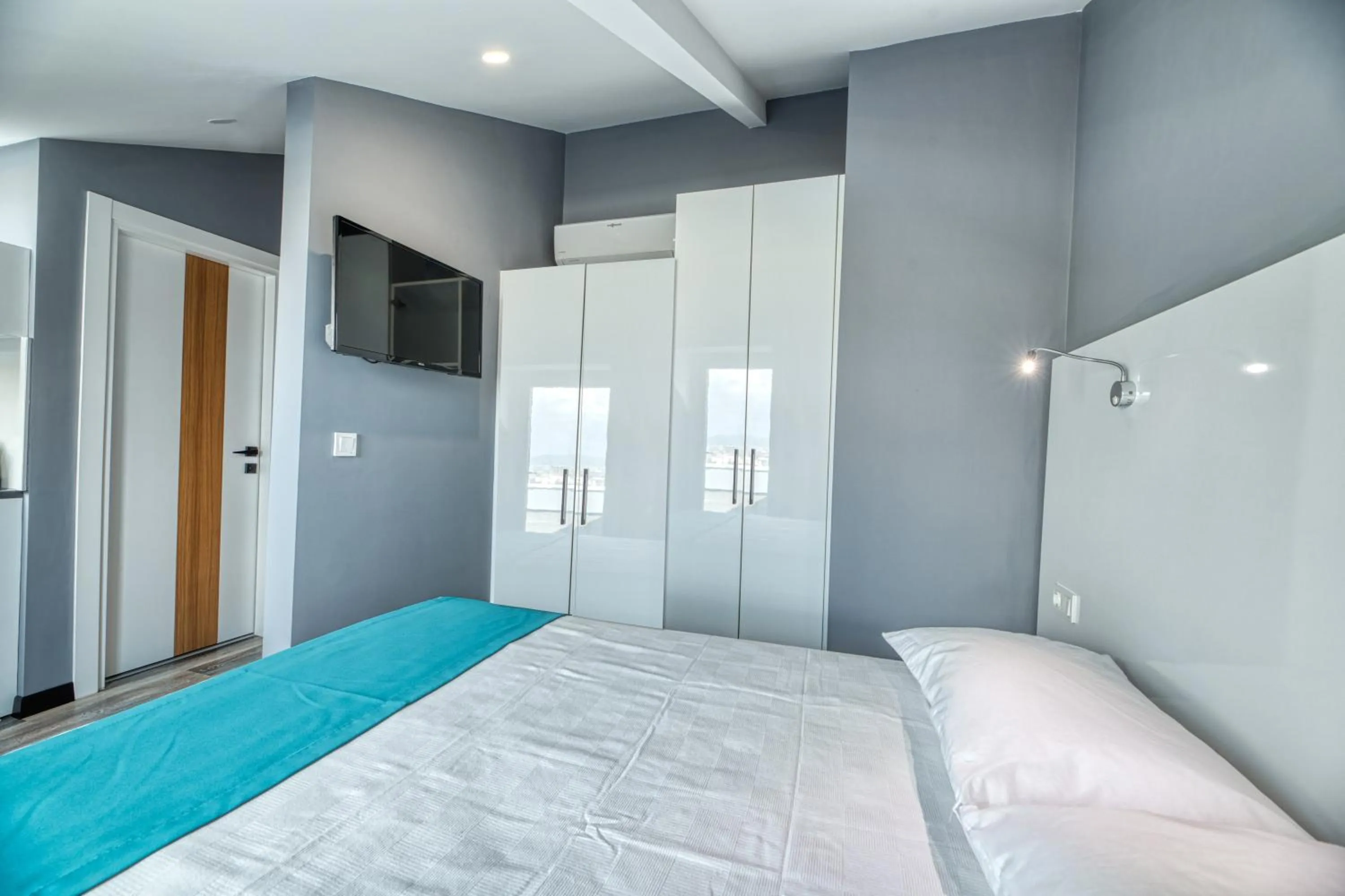 Bed in Grisverde Suites