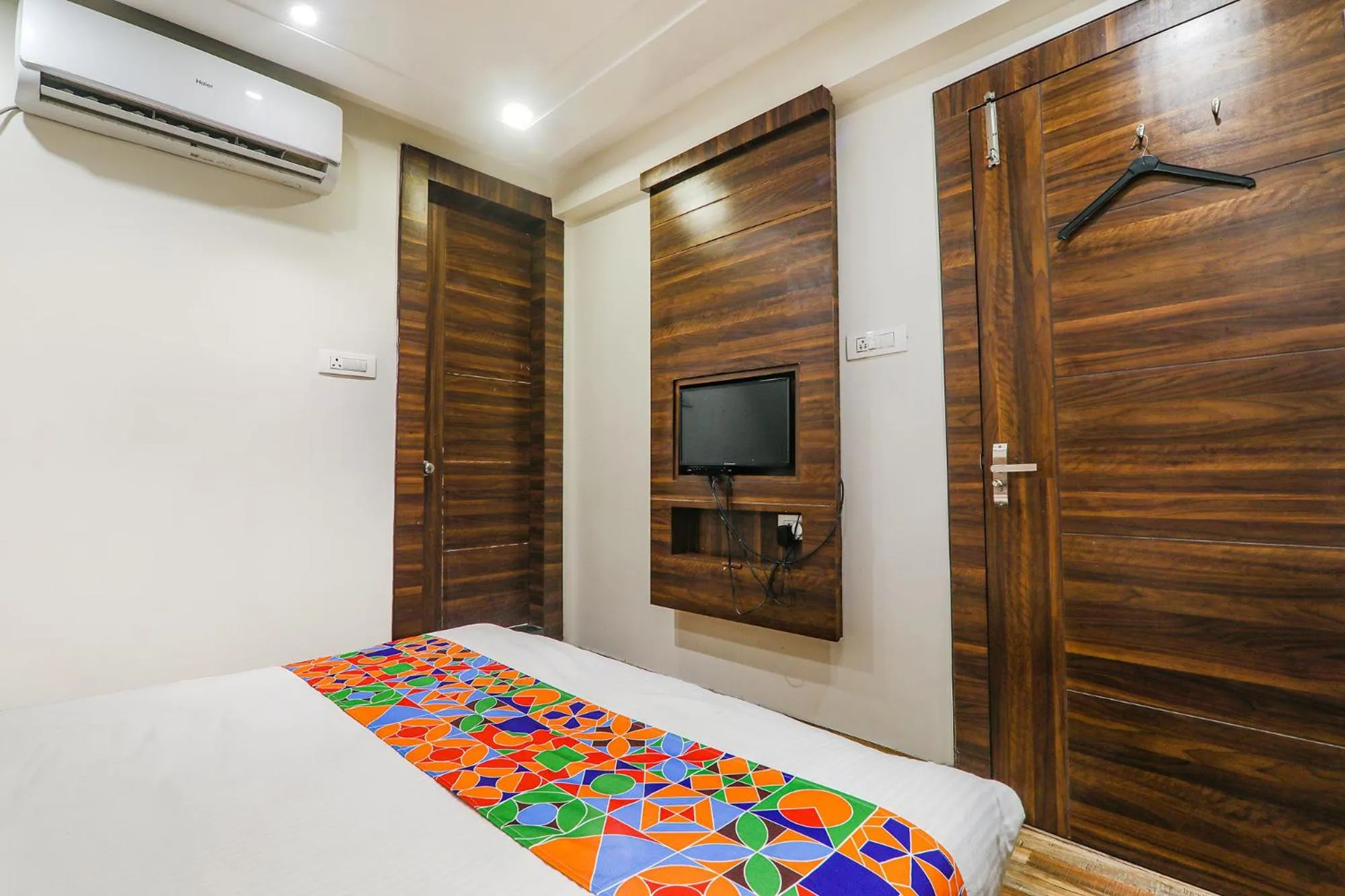 Bed in FabHotel Bless Inn