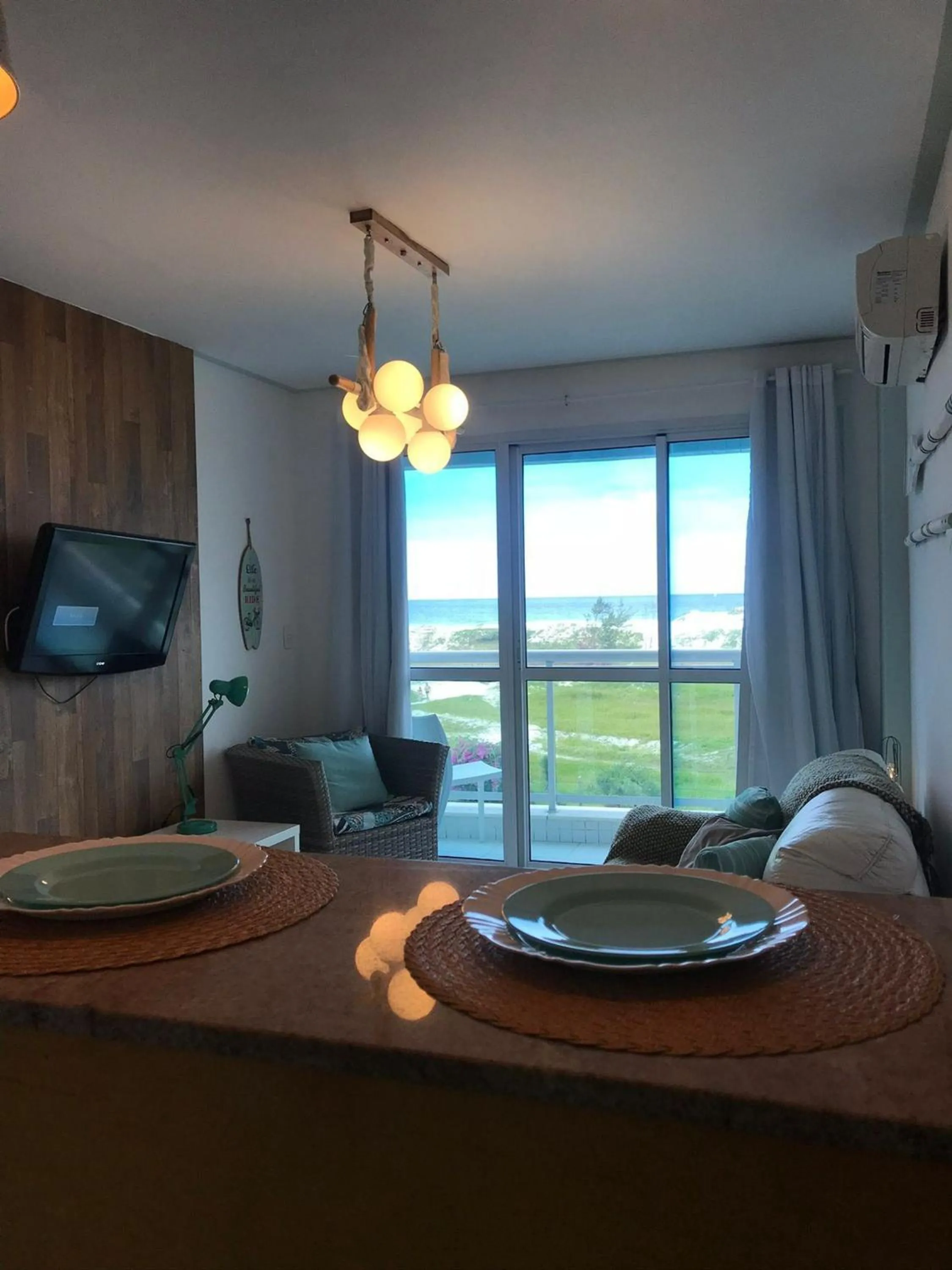 Living room in Flat Mandai Cabo Frio