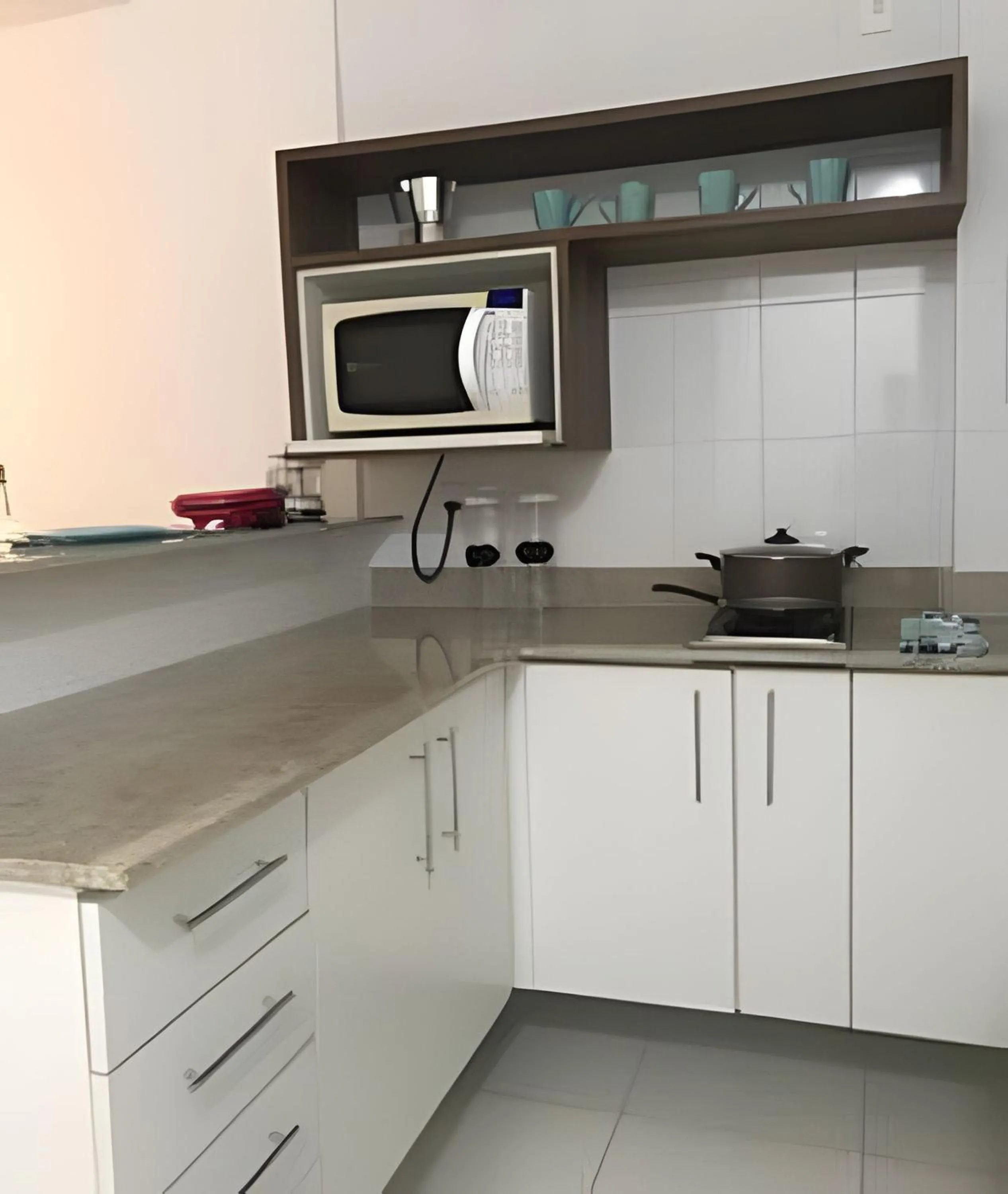 Kitchen or kitchenette in Flat Mandai Cabo Frio