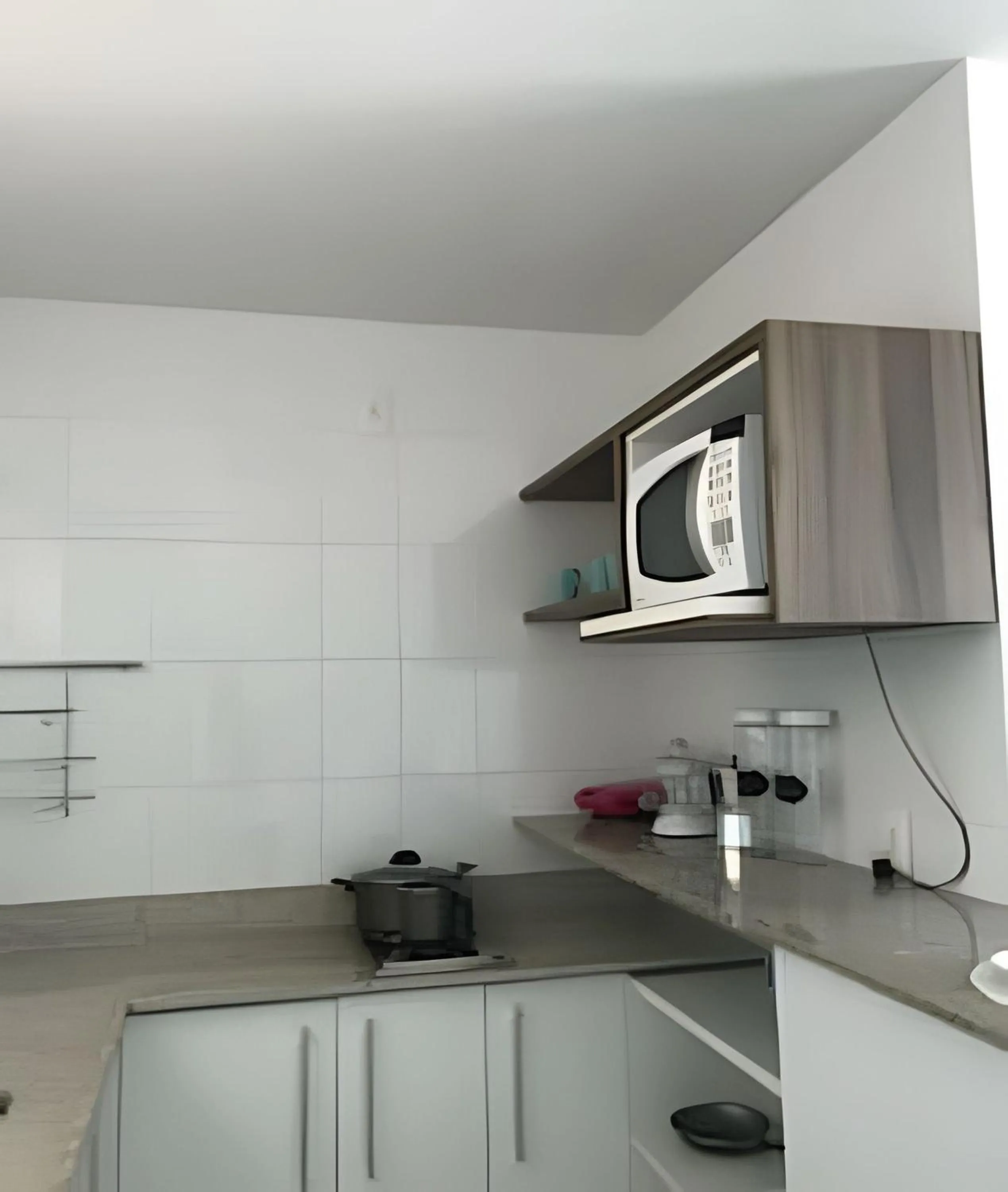 Kitchen or kitchenette in Flat Mandai Cabo Frio