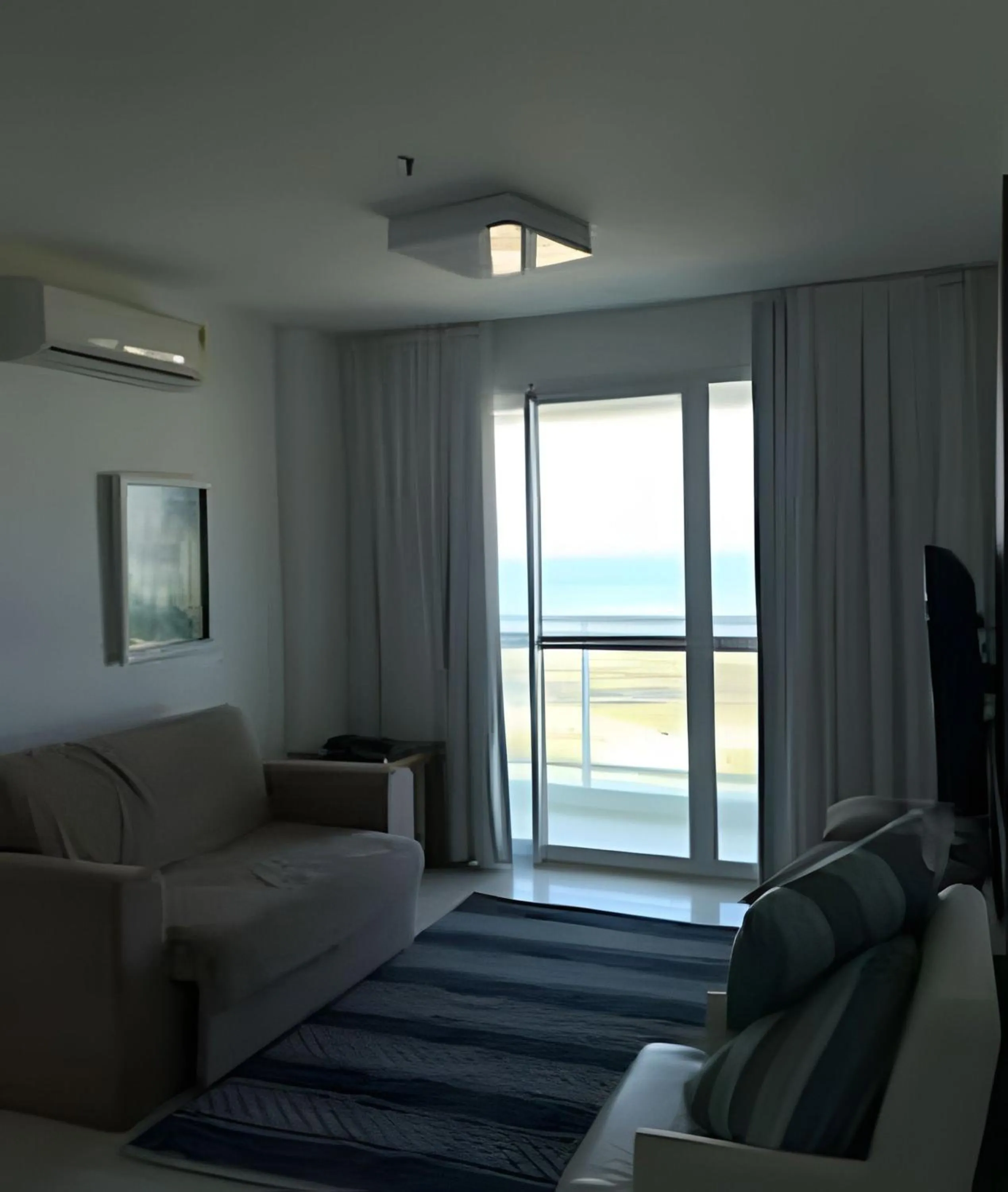 Living room in Flat Mandai Cabo Frio