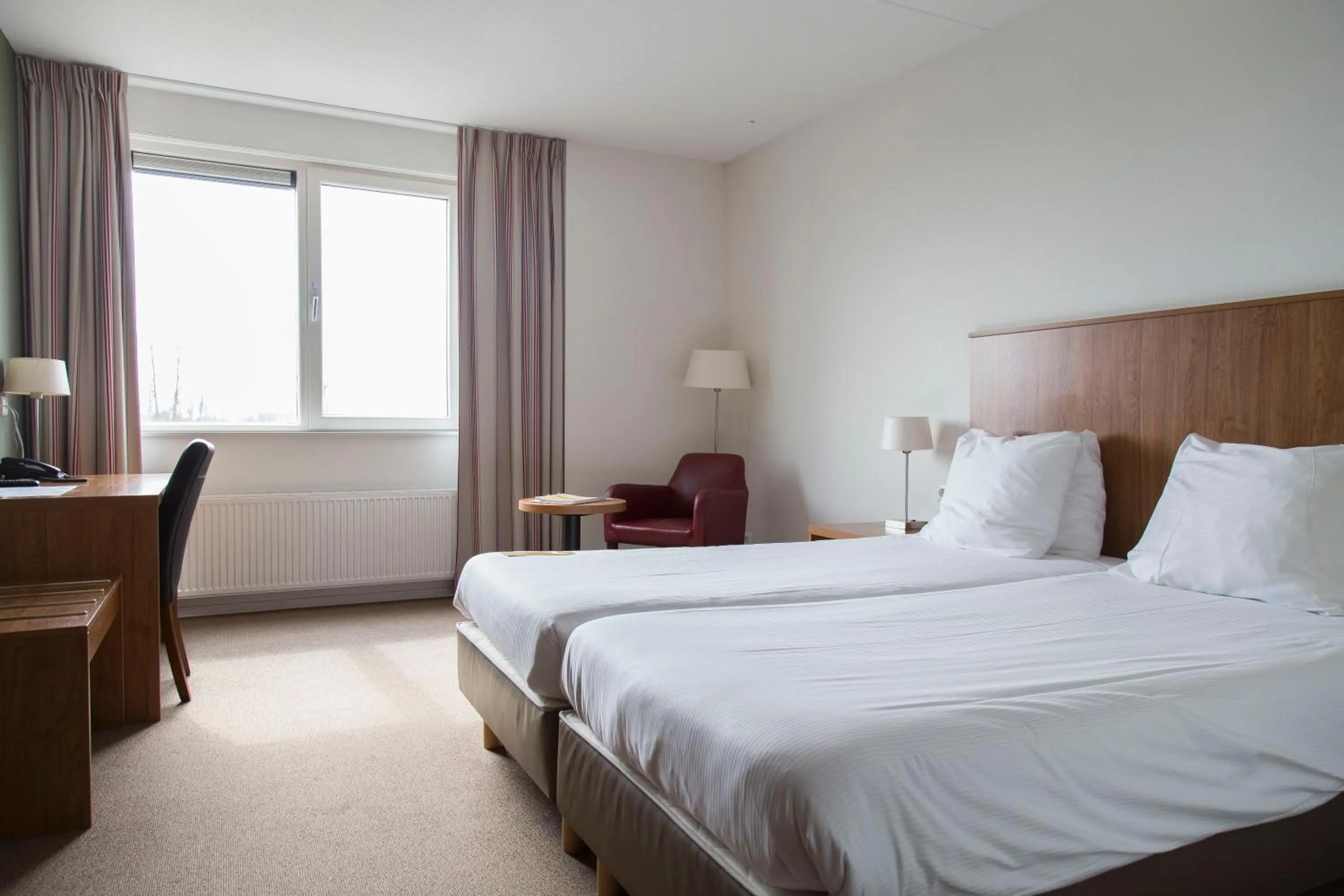 Bed in Strandhotel Vigilante