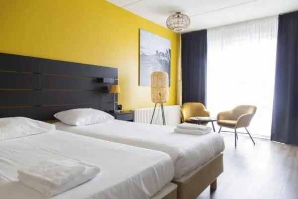 Bed in Strandhotel Vigilante