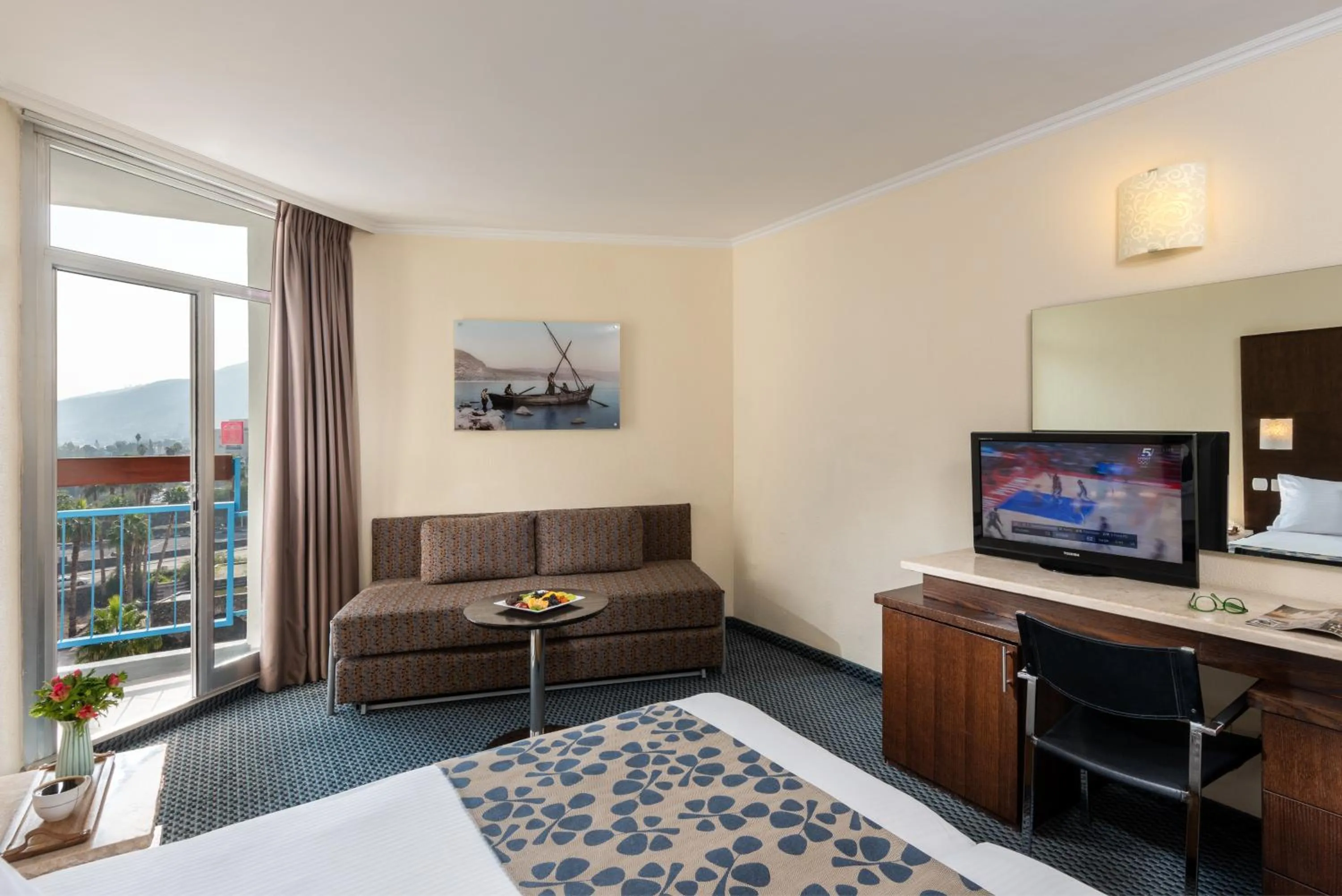 Seating area, Bed in Leonardo Club Tiberias - All Inclusive