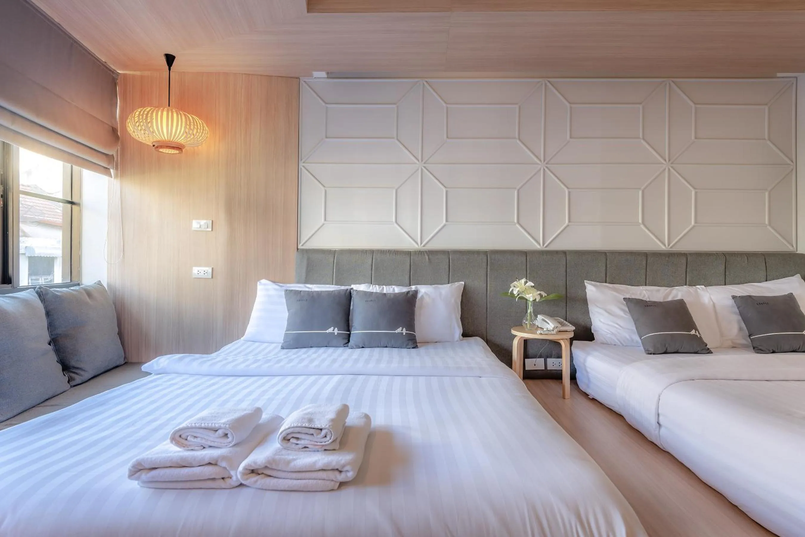 Bed in Tori Prestige Bangkok Hotel