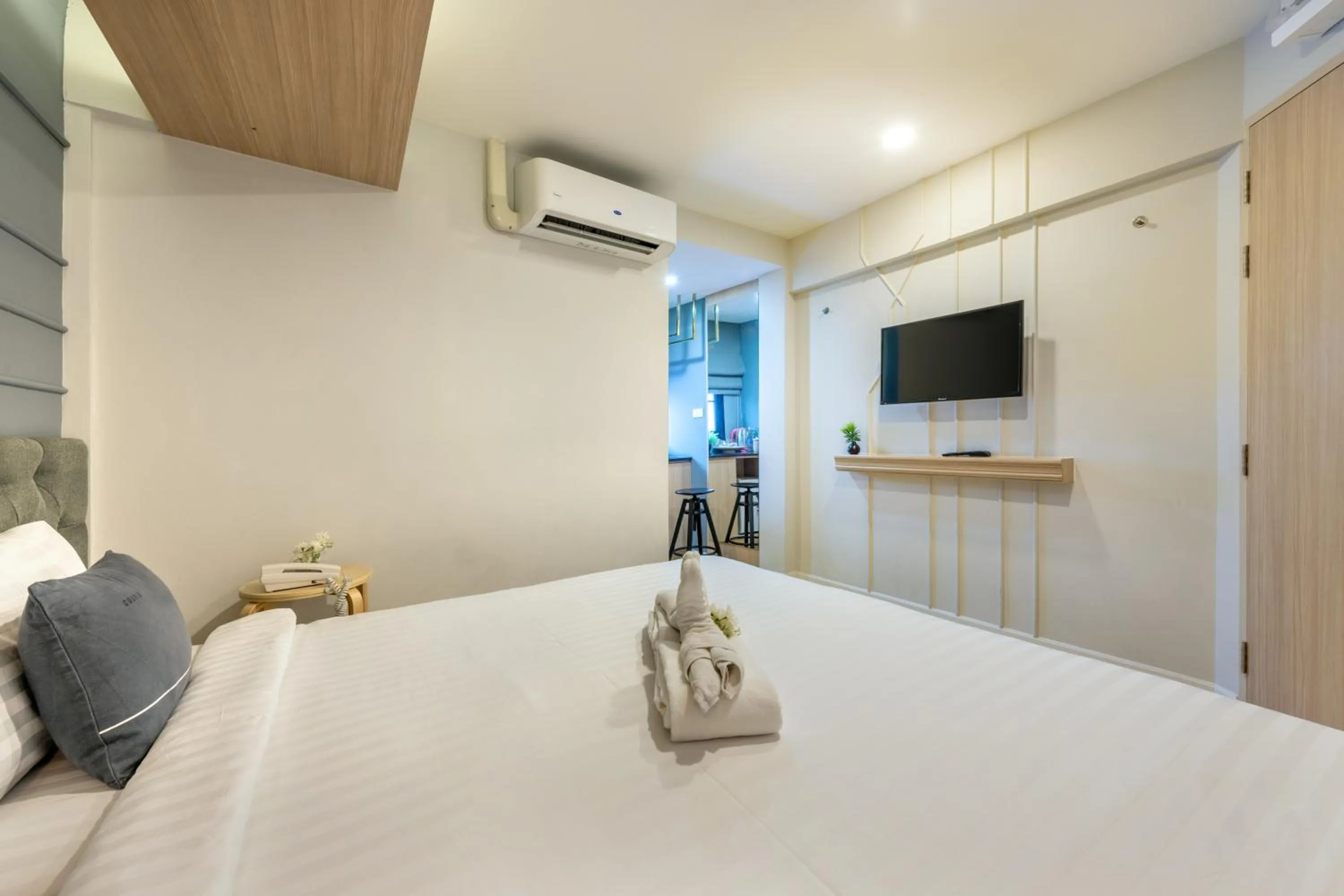 Bed in Tori Prestige Bangkok Hotel