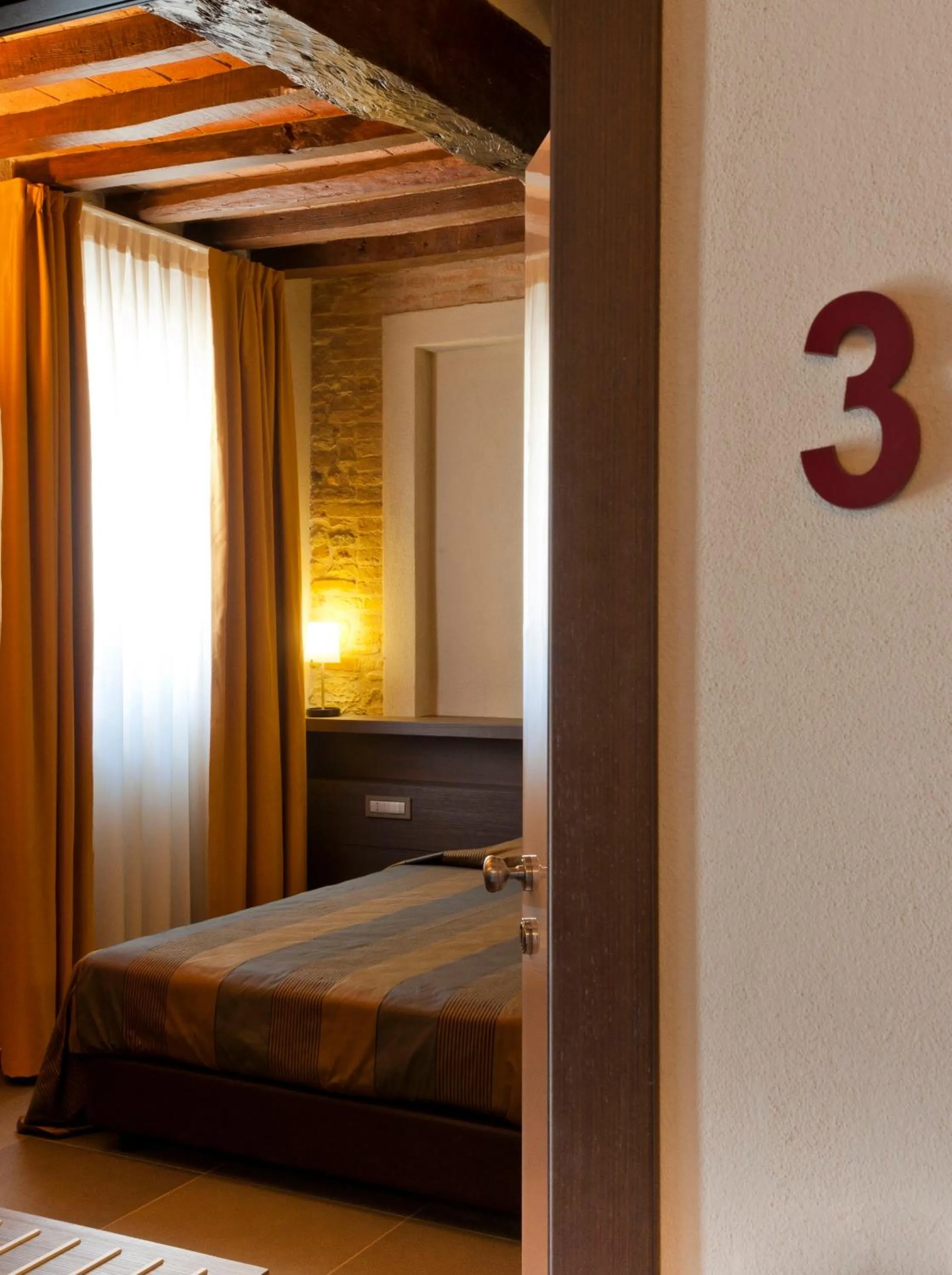 Bed in Locanda Sant'Ambrogio