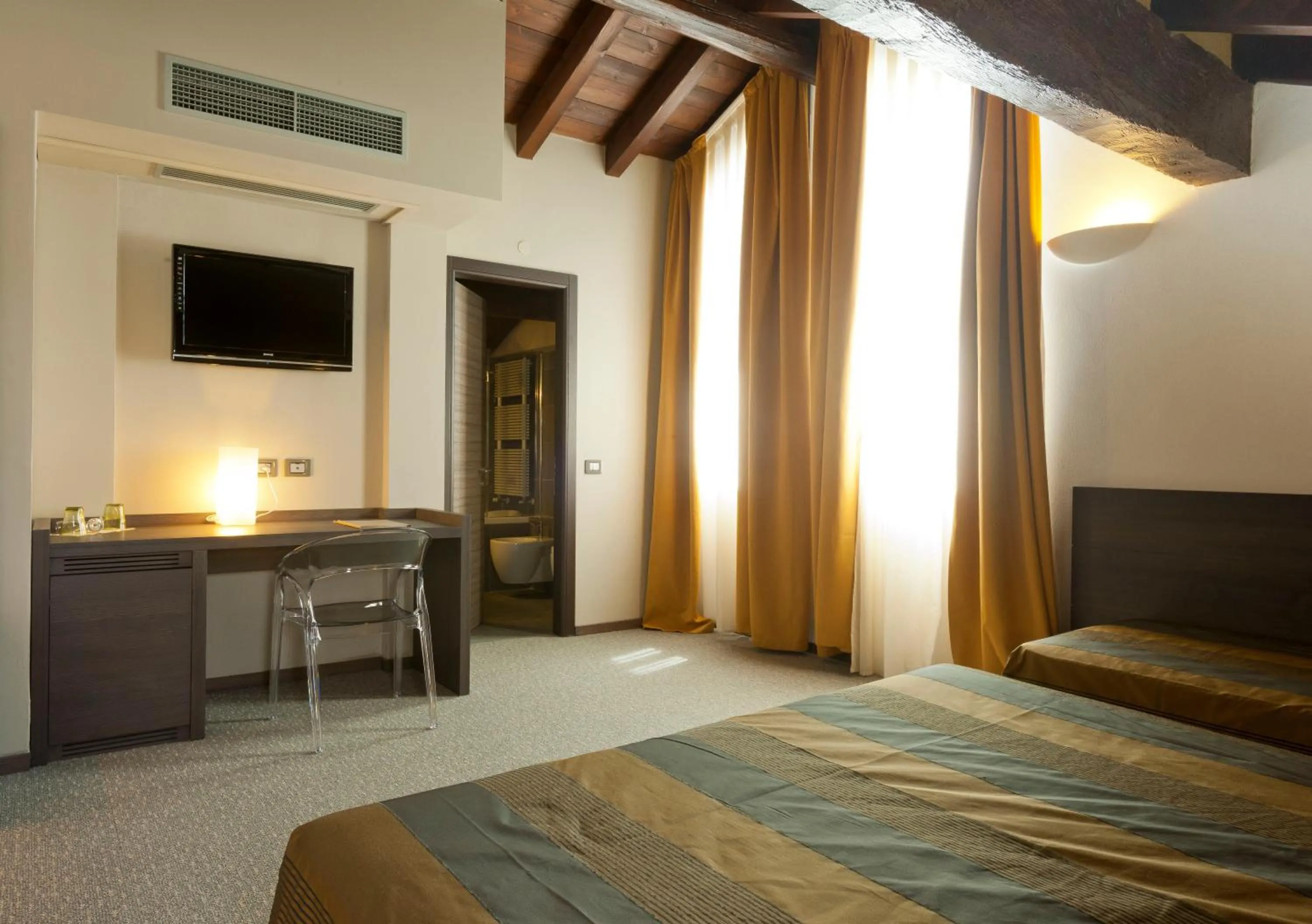 Bed in Locanda Sant'Ambrogio