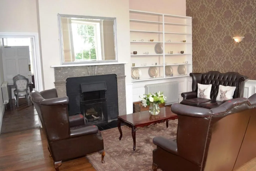 Communal lounge/ TV room, Seating Area in The Clock House