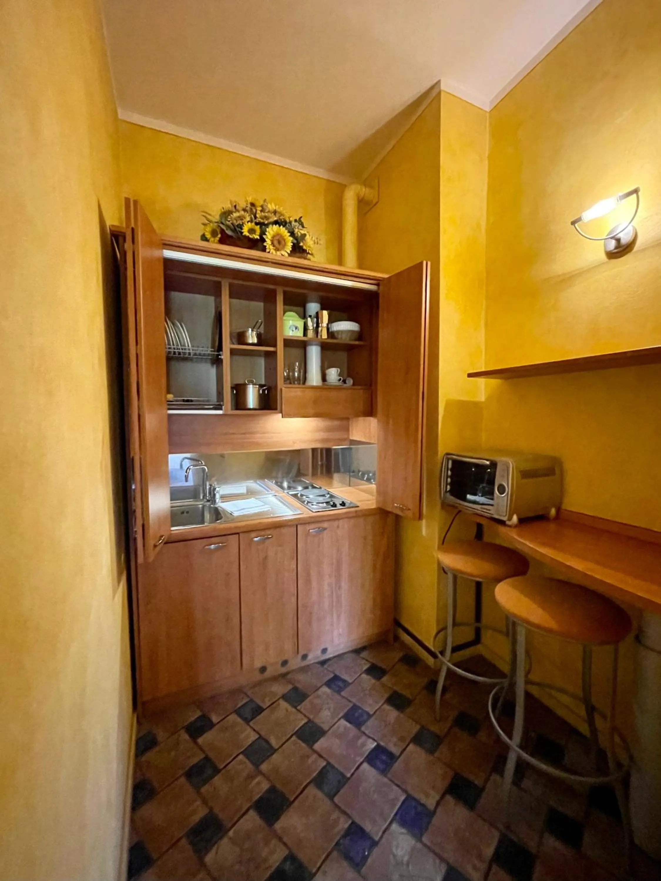 Kitchen or kitchenette in Residence Corte della Vittoria