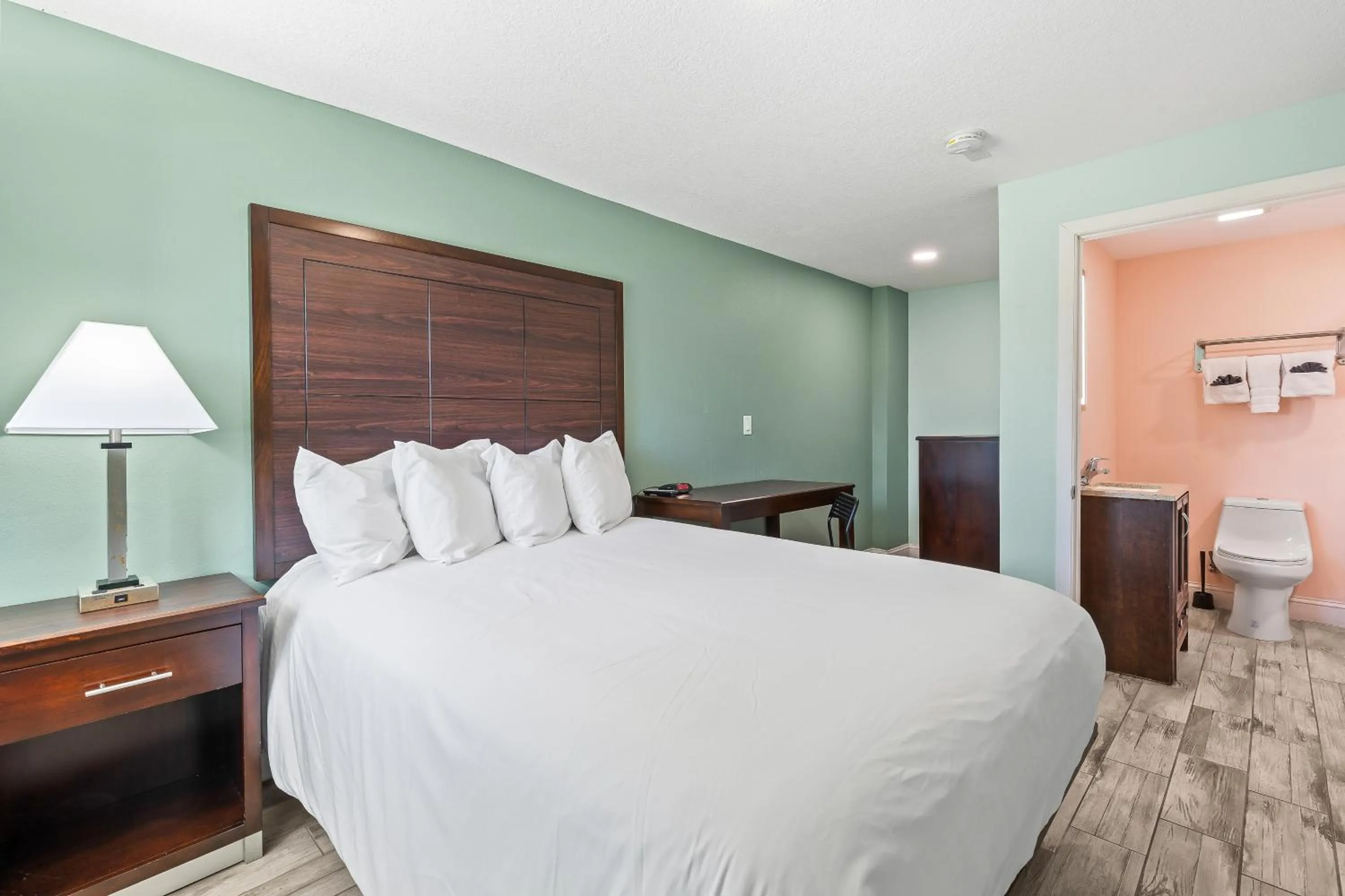 Bed in Atlantic Shores Motel