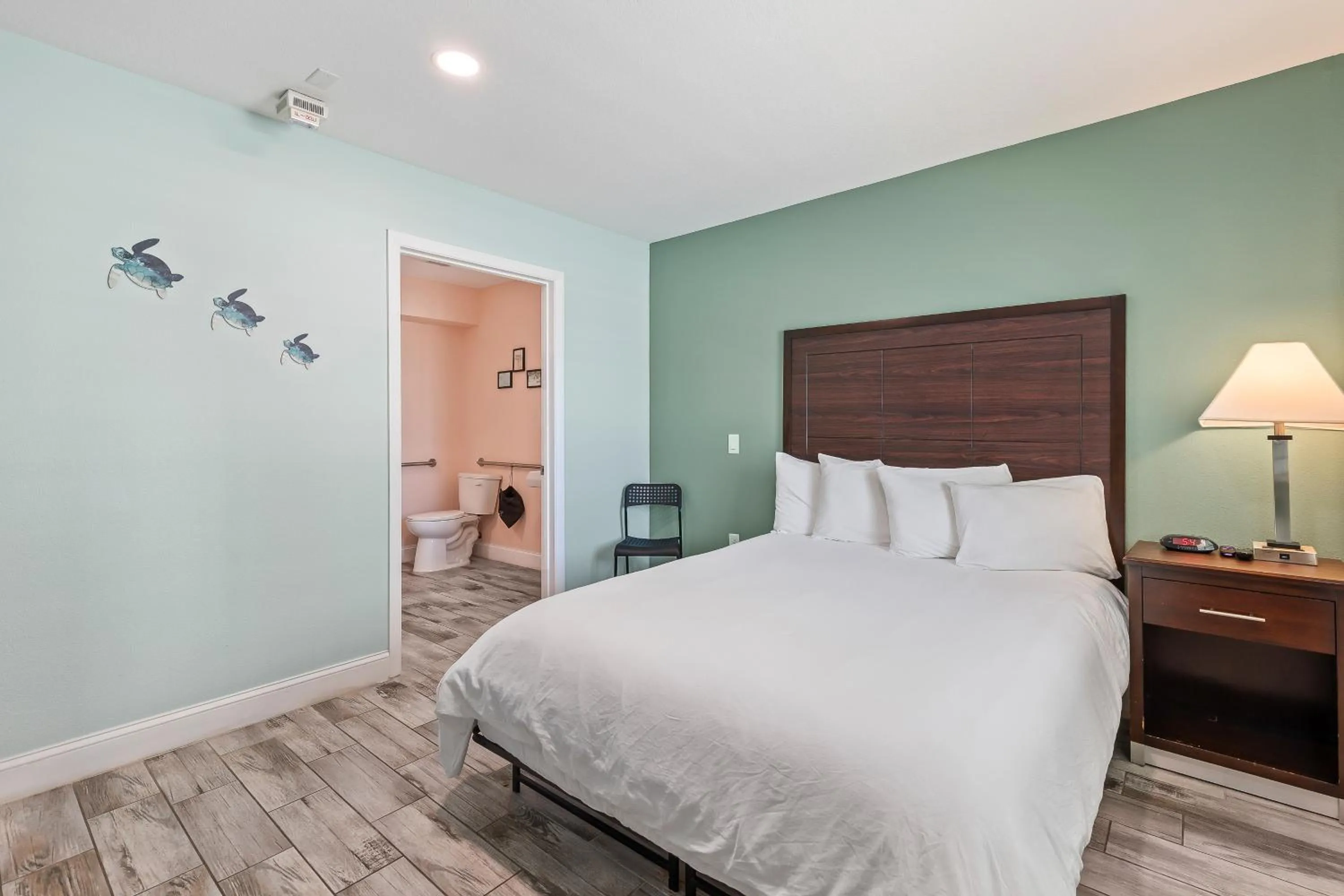 Bed in Atlantic Shores Motel