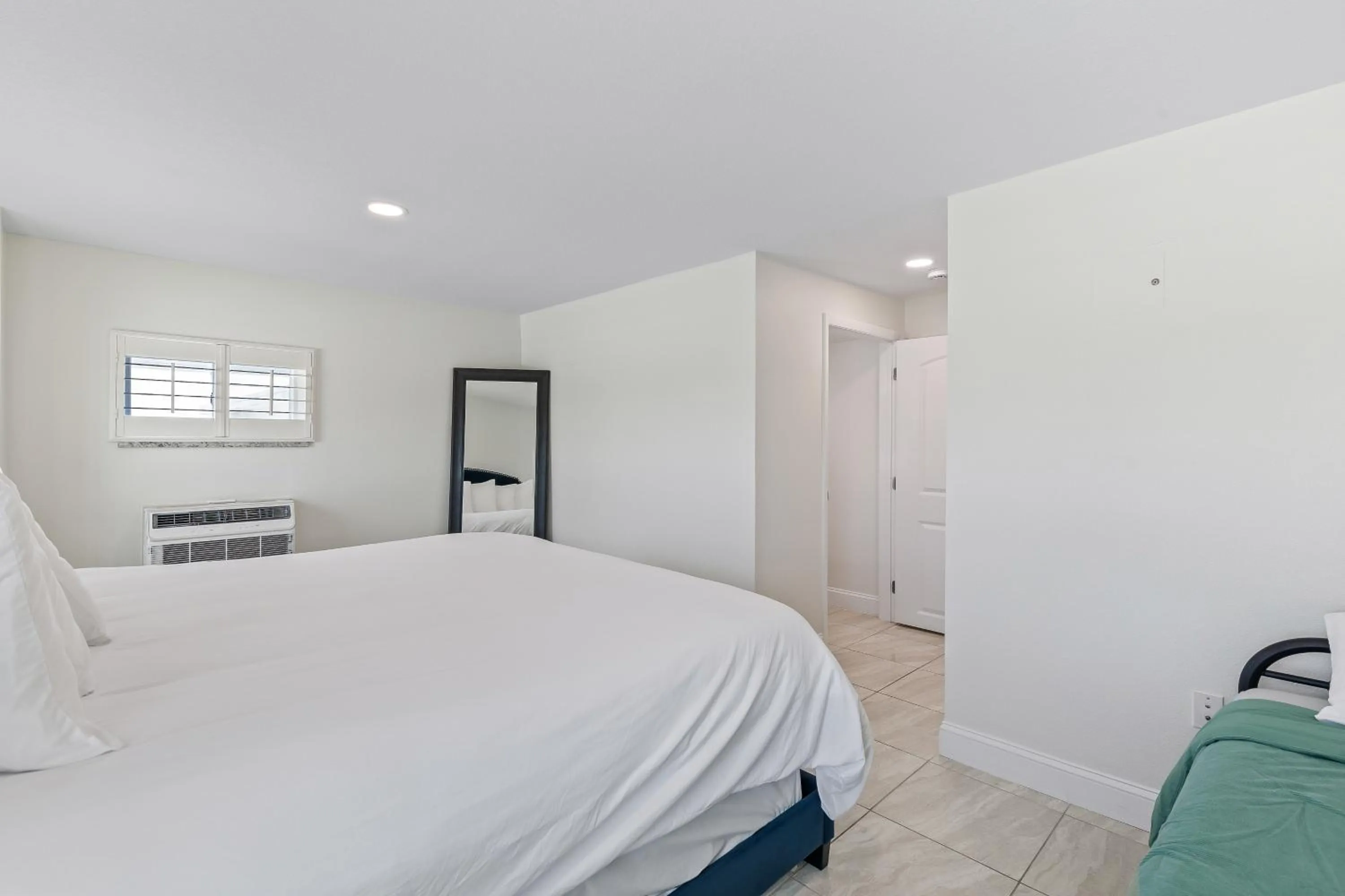 Bed in Atlantic Shores Motel