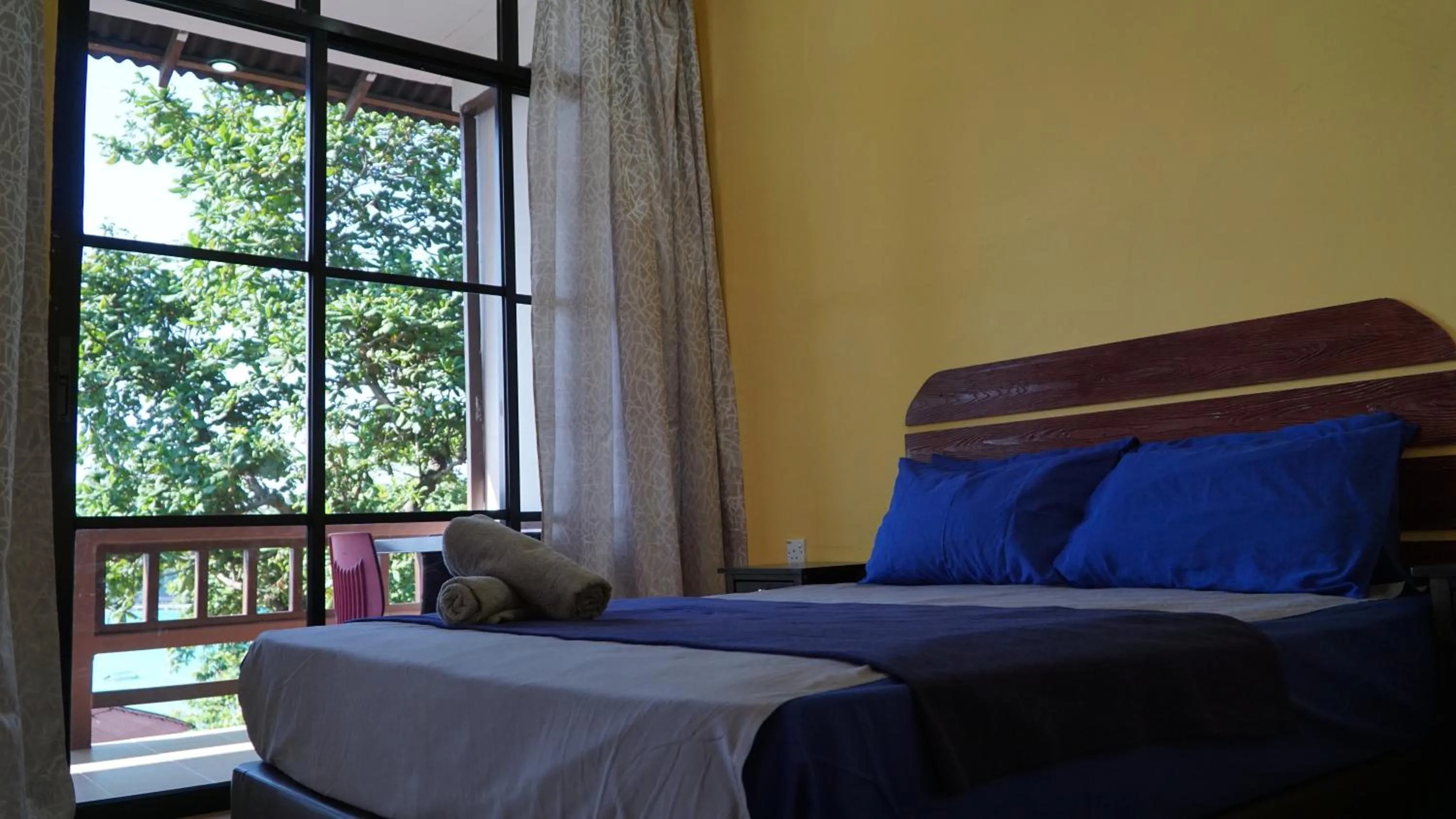 Bed in D Rock Garden Resort