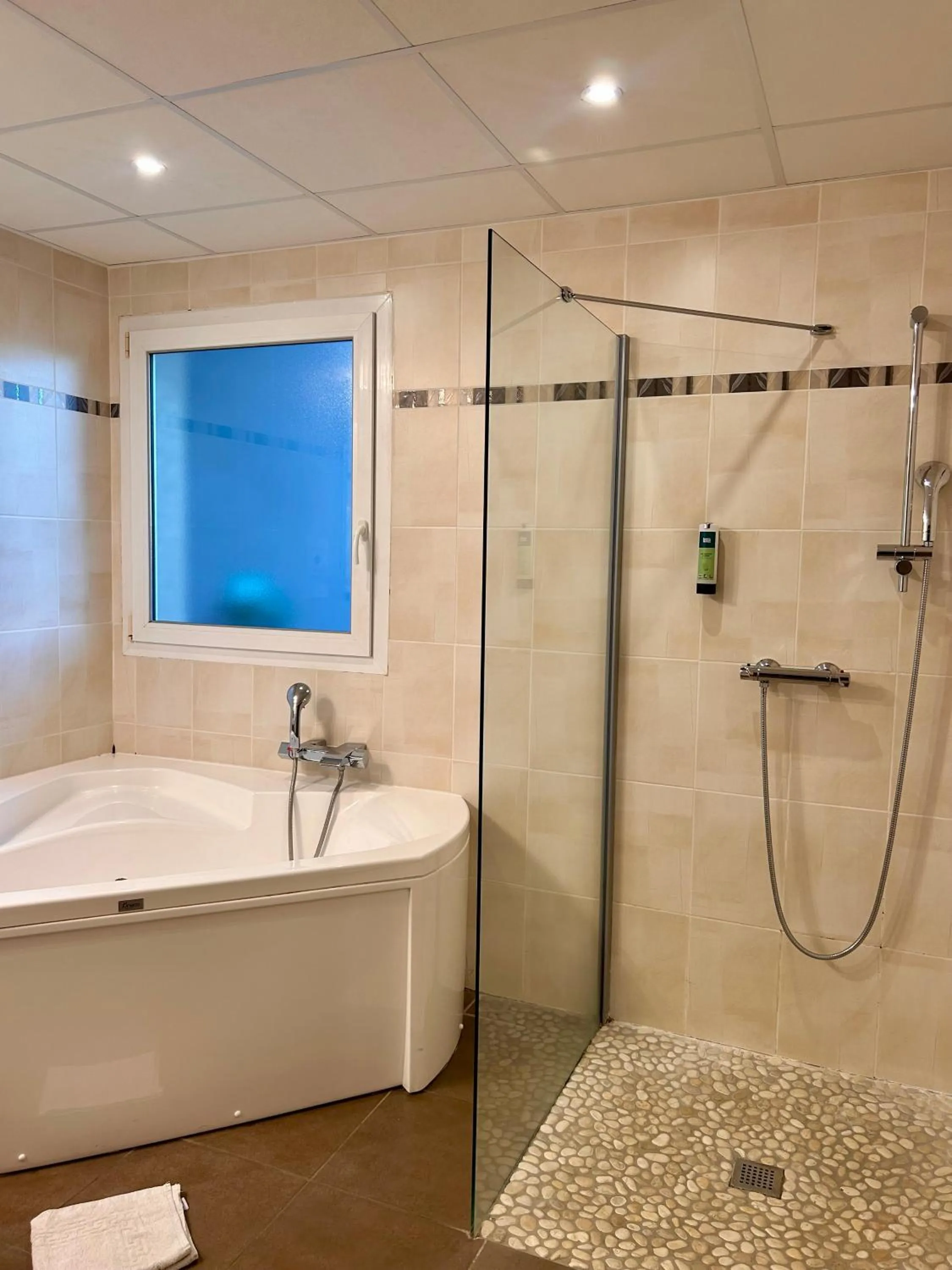 Bathroom in Logis Hôtel La Fauceille