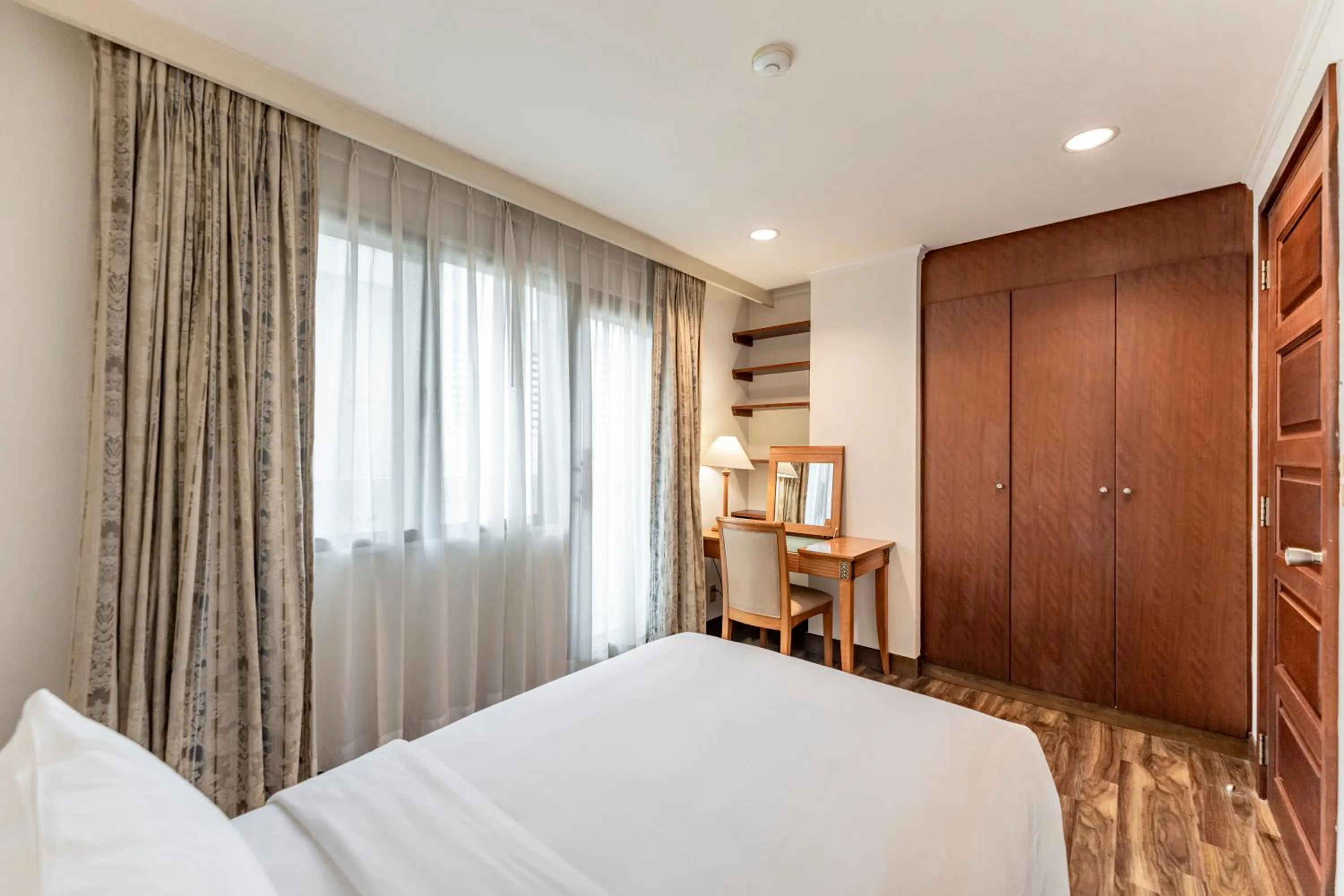 Bed in Garden View Court Suites Ho Chi Minh City