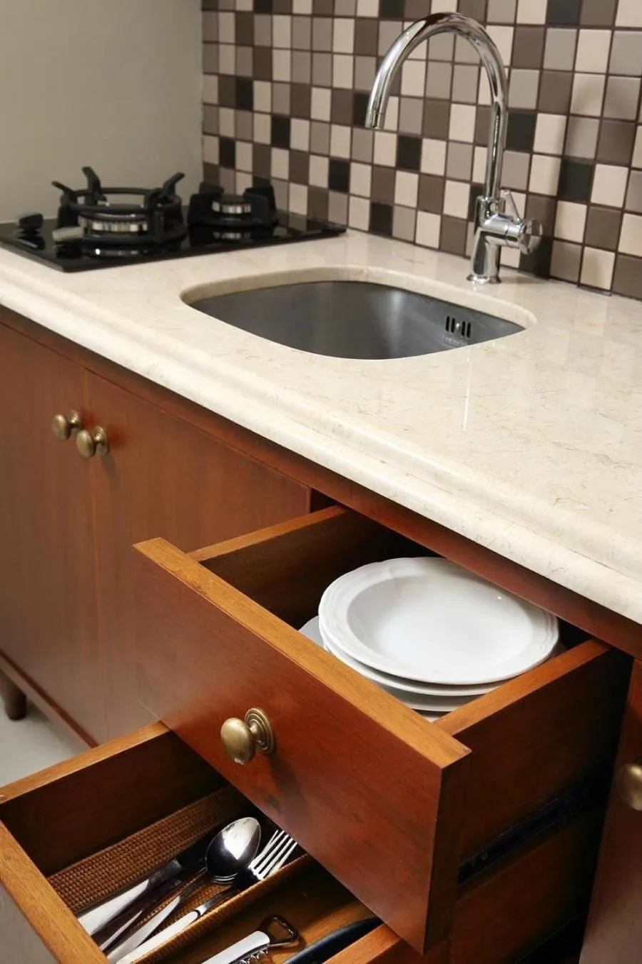 Kitchen or kitchenette in Seminyak Lagoon All Suites Hotel