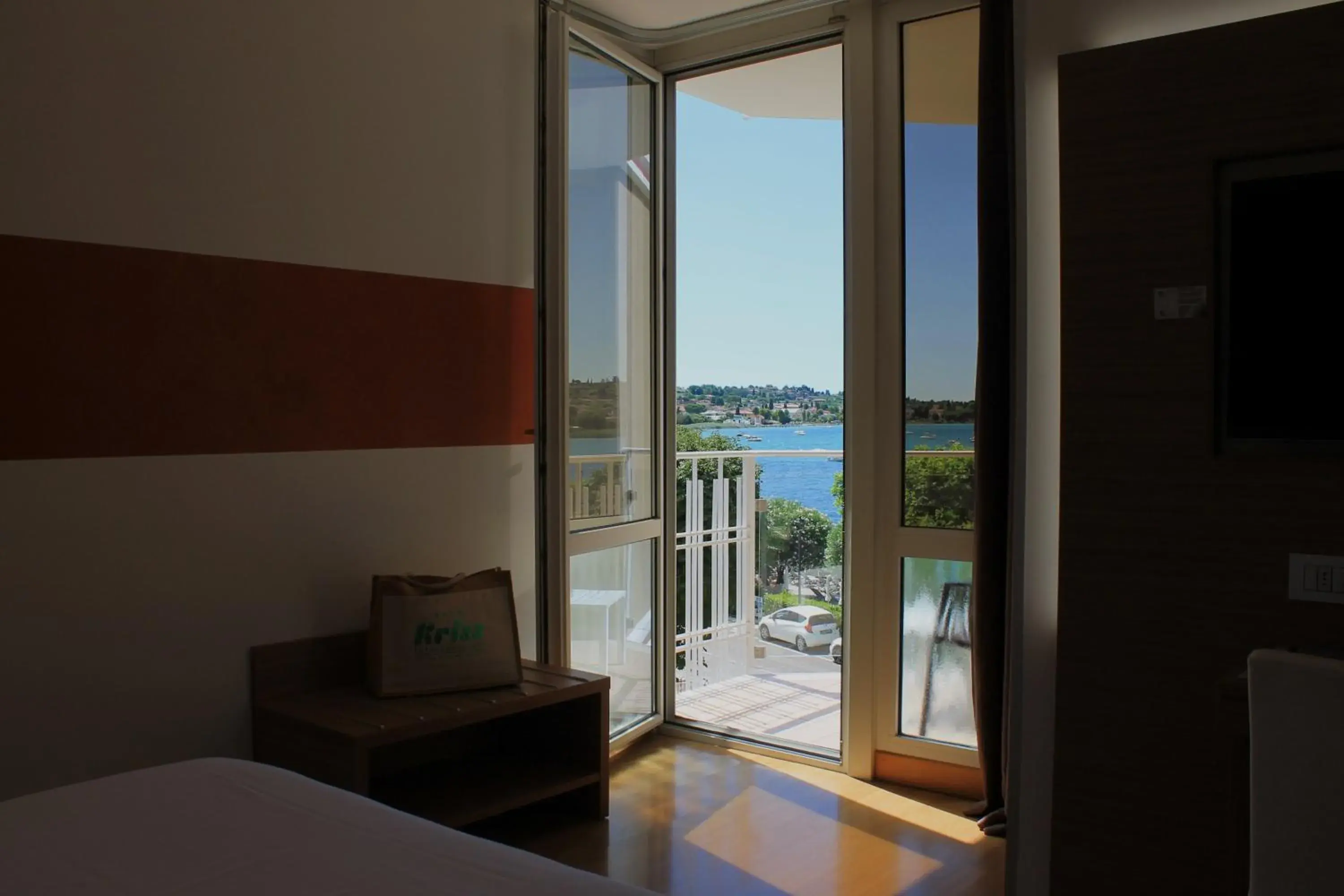 Superior Double Room with Partial Lake View in Kriss Internazionale Hotel Superior Double Room with Partial Lake View in Kriss Internazionale Hotel