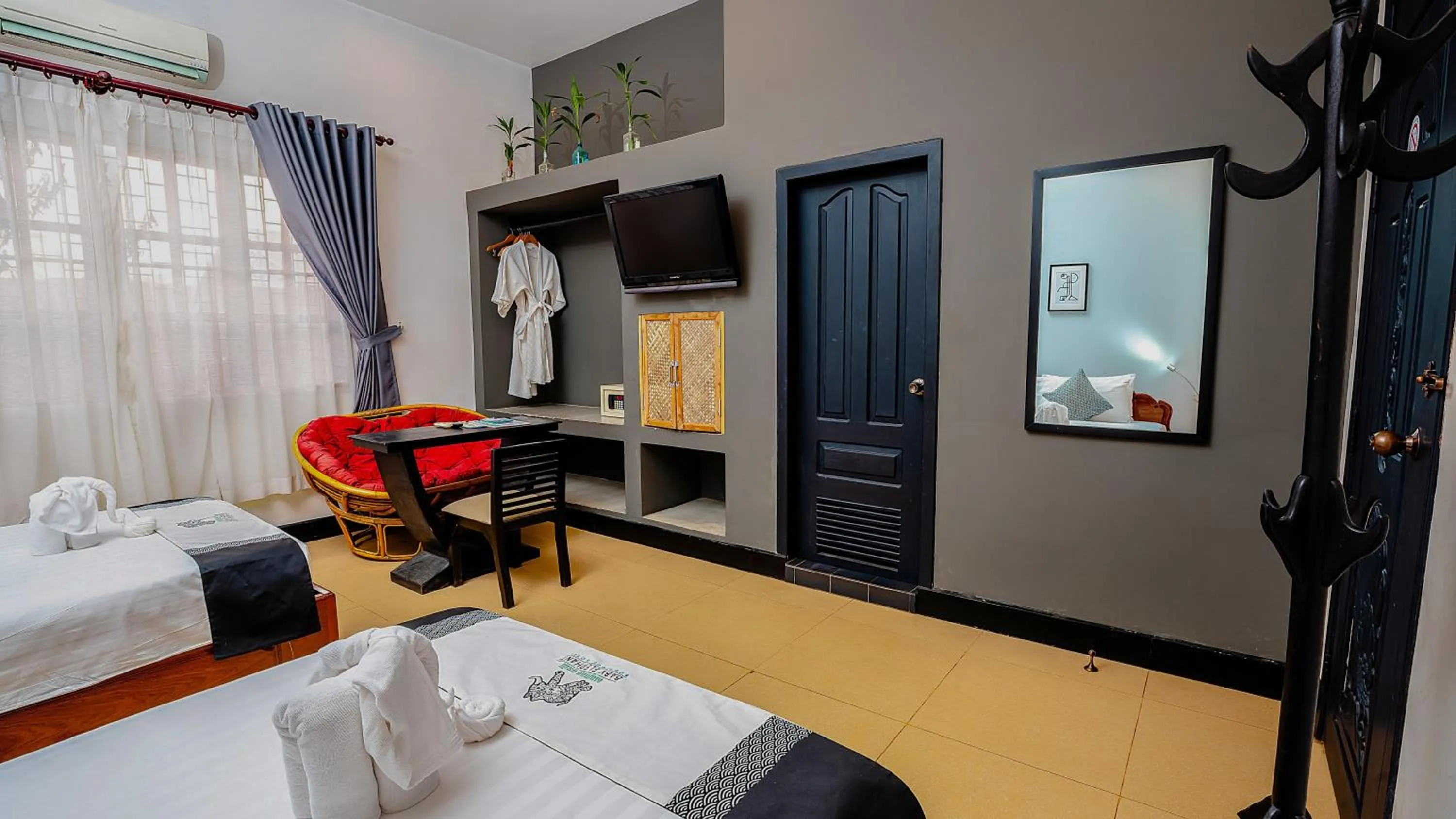 Seating area, Bed in Baby Elephant Boutique Hotel