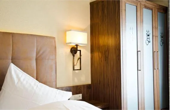 Decorative detail, Bed in Hotel Garni Caroline