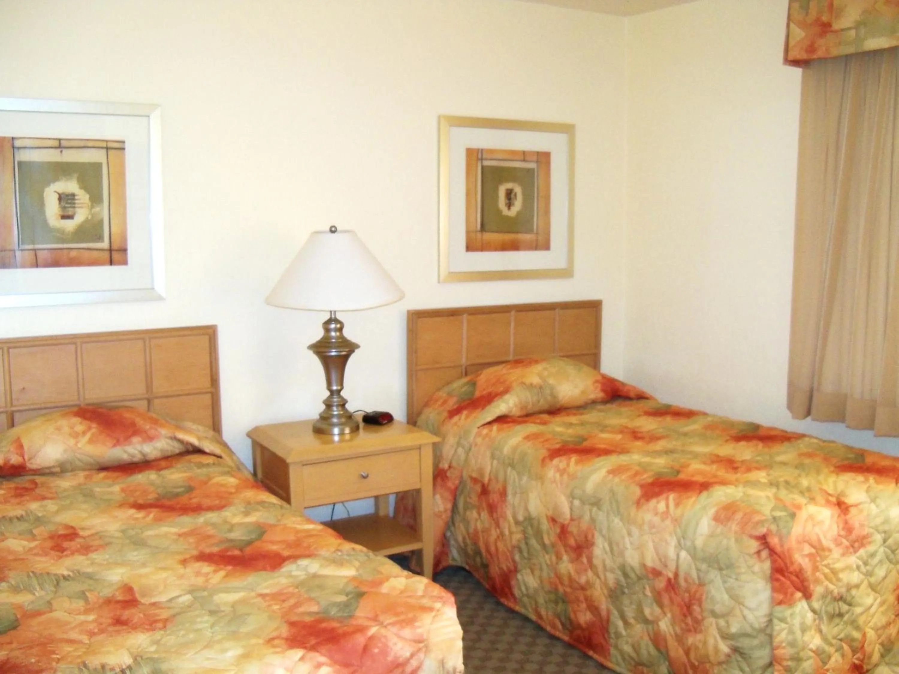 Bed in Desert Vacation Villas