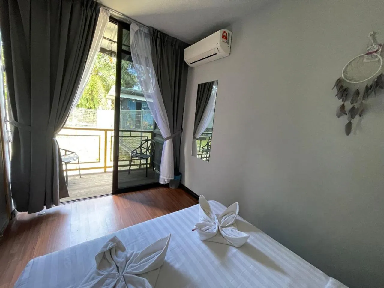 Photo of the whole room, Bed in 7 Inn Semporna