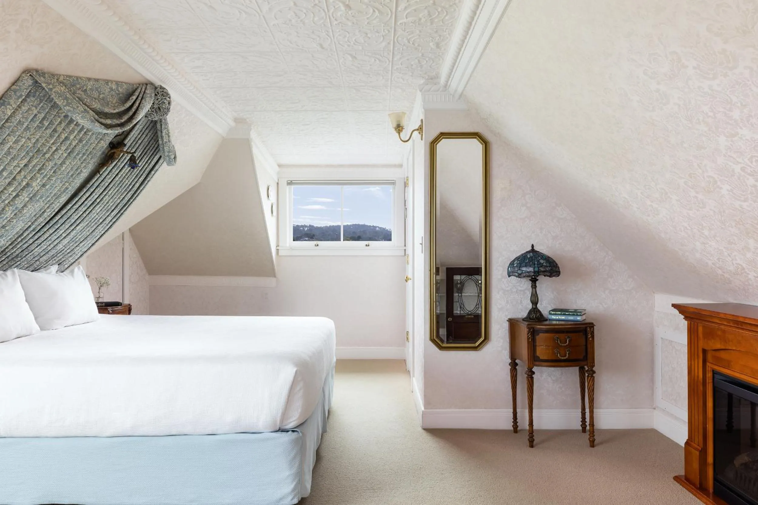 Bed in Seven Gables Inn on Monterey Bay, A Kirkwood Collection Hotel