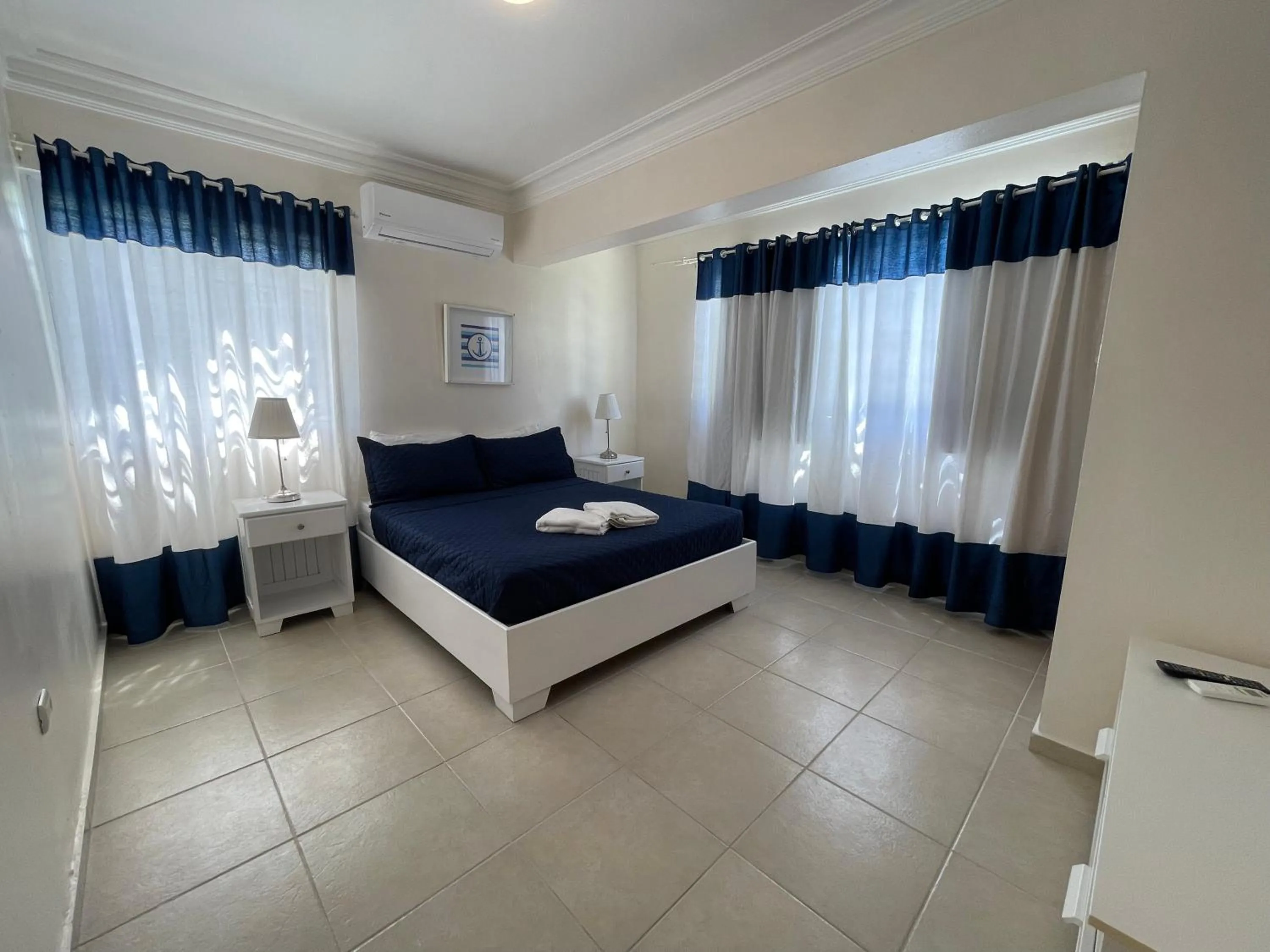 Photo of the whole room, Bed in Karimar Beach Condo Hotel