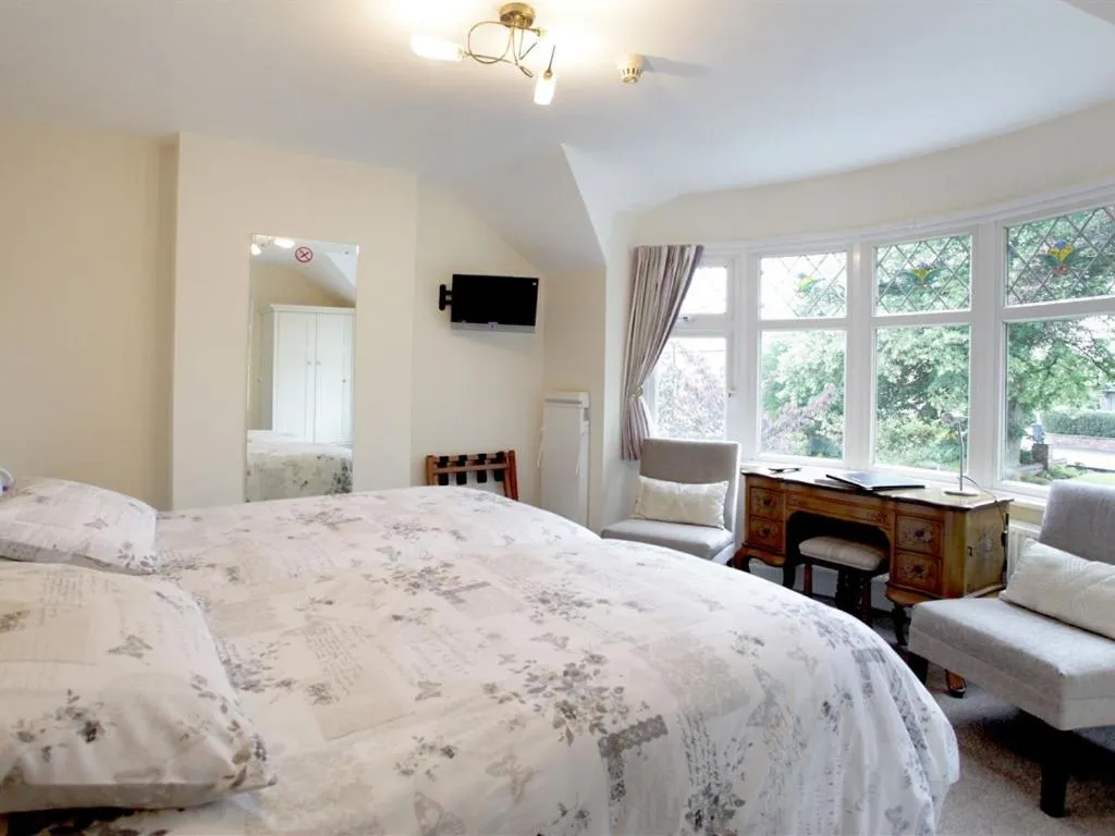 Bed in The Hinton Guest House