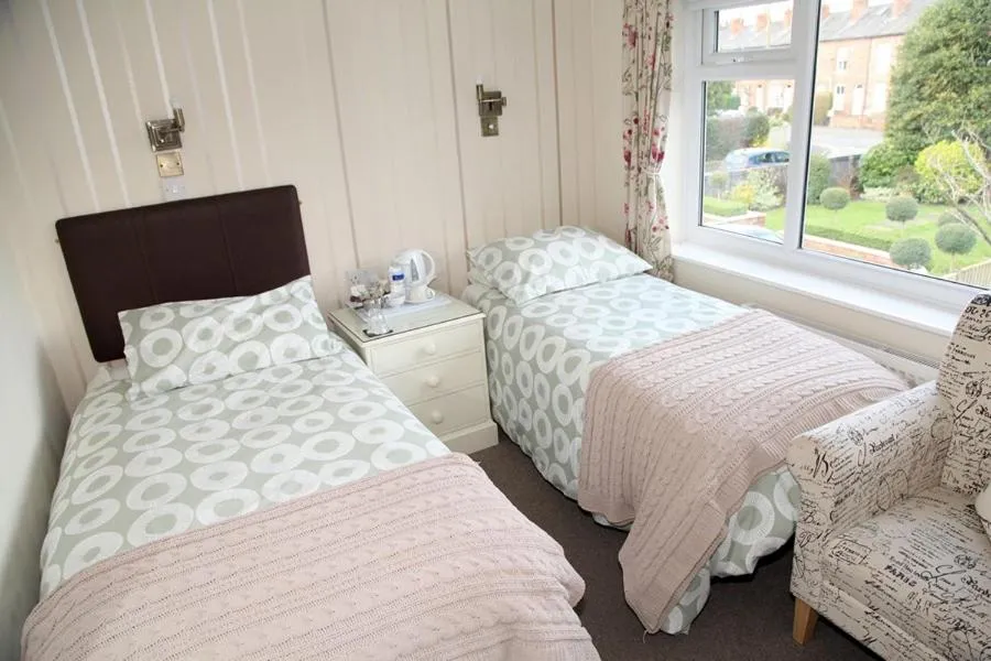 Bed in The Hinton Guest House