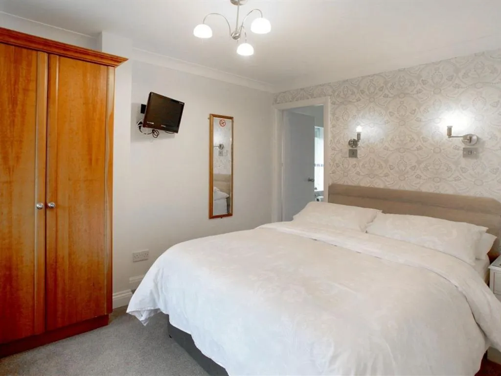 Bed in The Hinton Guest House