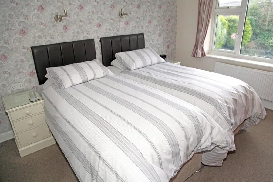 Bed in The Hinton Guest House