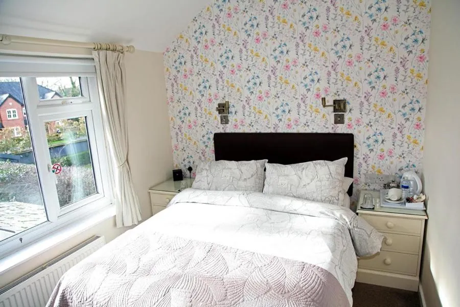 Bed in The Hinton Guest House